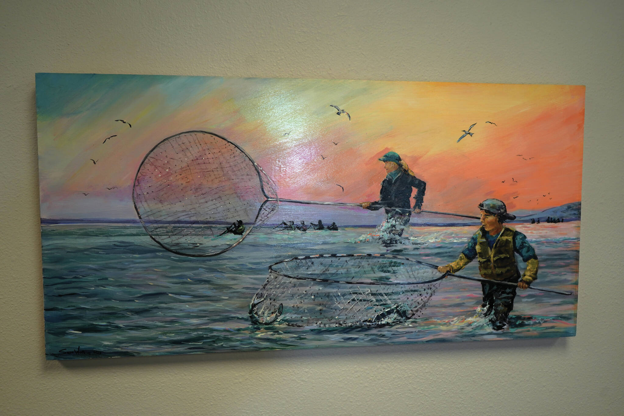 A painting by Susan Watkins hangs at the Kenai Art Center on Wednesday, as part of “Up Close and Far Away — My View,” the center’s August exhibit. (Jake Dye/Peninsula Clarion)