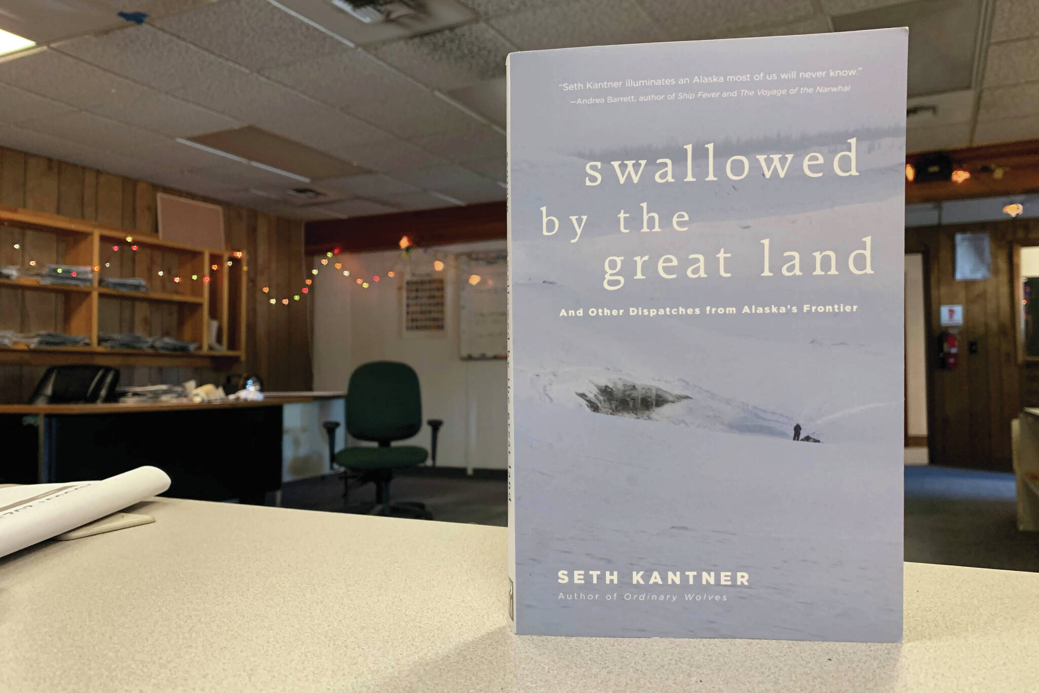 Ashlyn O’Hara/Peninsula Clarion
A copy of “Swallowed by the Great Land” sits on a desk in the Peninsula Clarion offices on Thursday in Kenai.