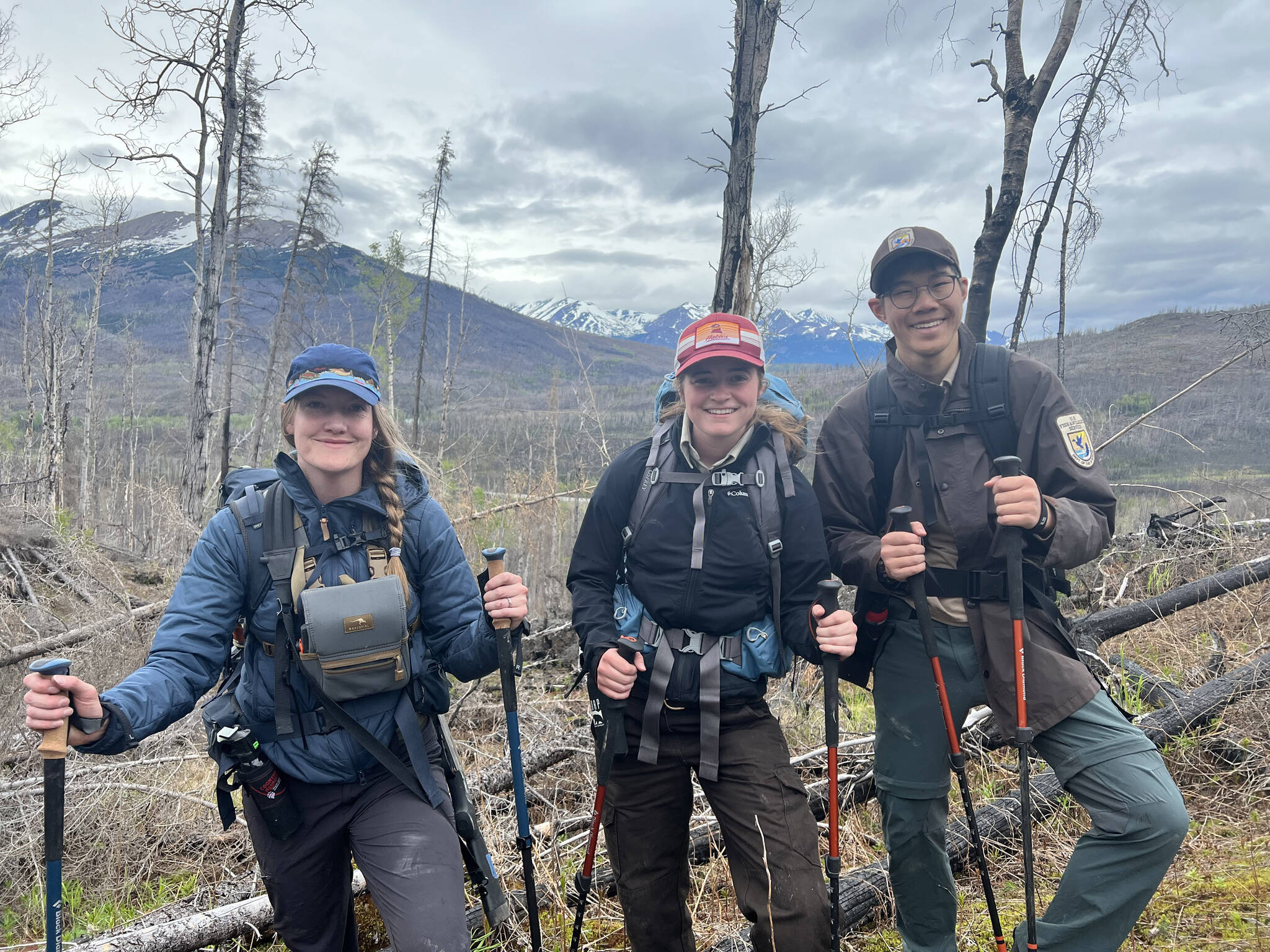 Biology field crew after collecting Dall Sheep scat to determine plant species composition in their diet. (Photo by USFWS/Colin Canterbury)