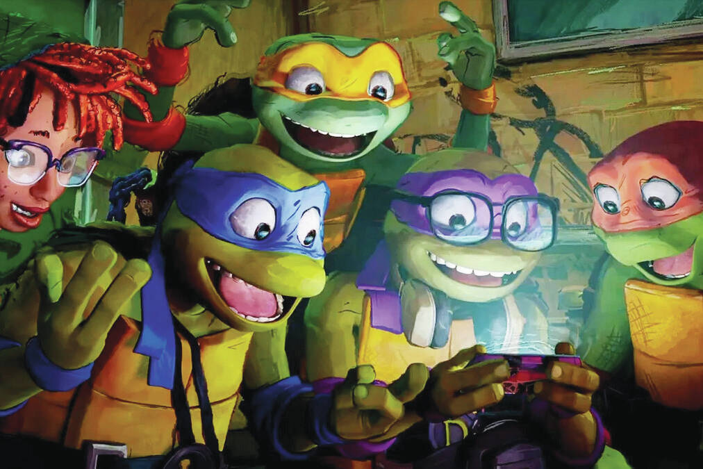 April O'Neil, Leonardo, Michelangelo, Donatello and Raphael gather around a cell phone in "Teenage Mutant Ninja Turtles: Mutant Mayhem." (Photo courtesy Paramount)