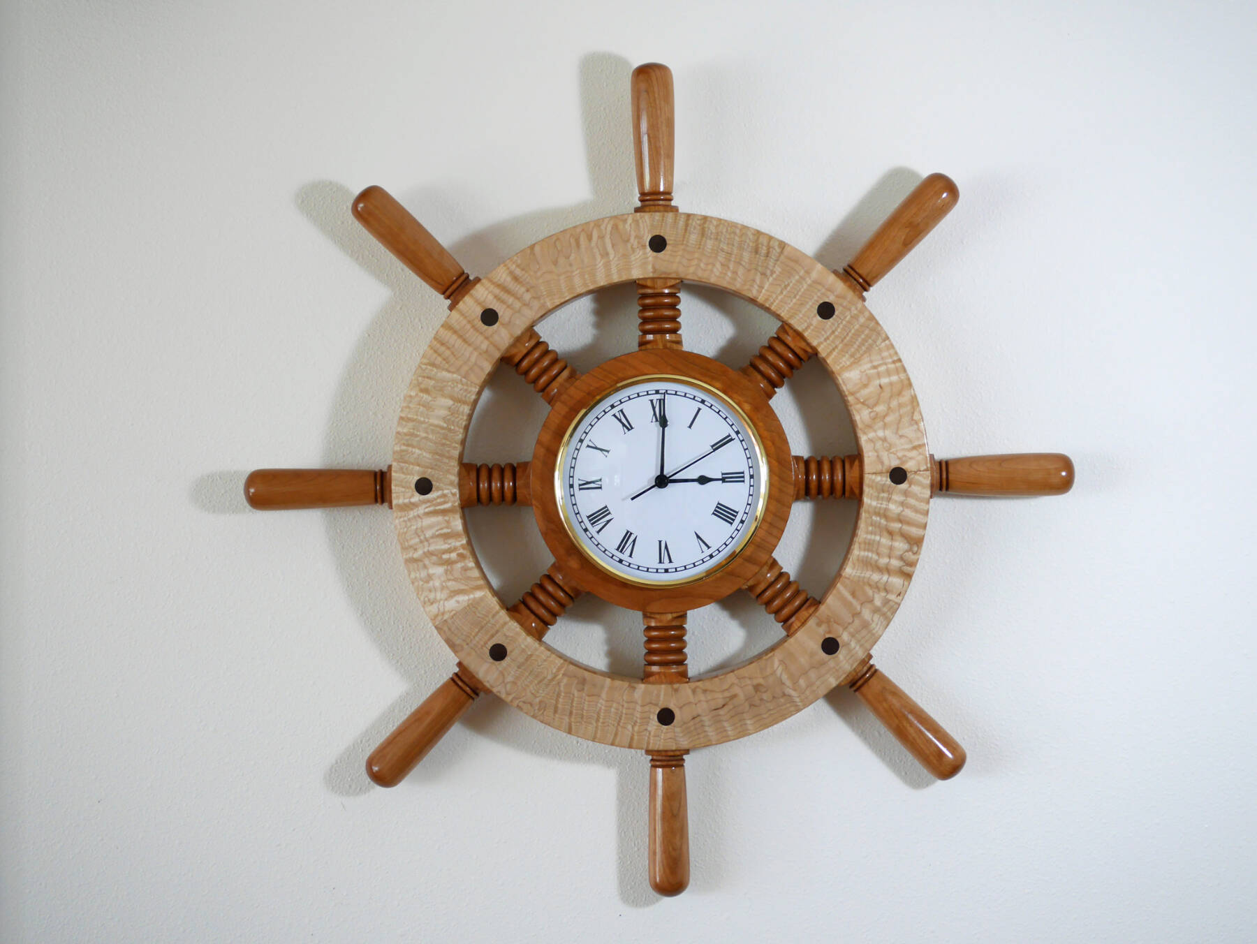 A wooden Ship’s Wheel Clock was created by Homer woodworker Ted Heuer, whose work is available year-round at Ptarmigan Arts, in 2018. Photo by Ted Heuer
