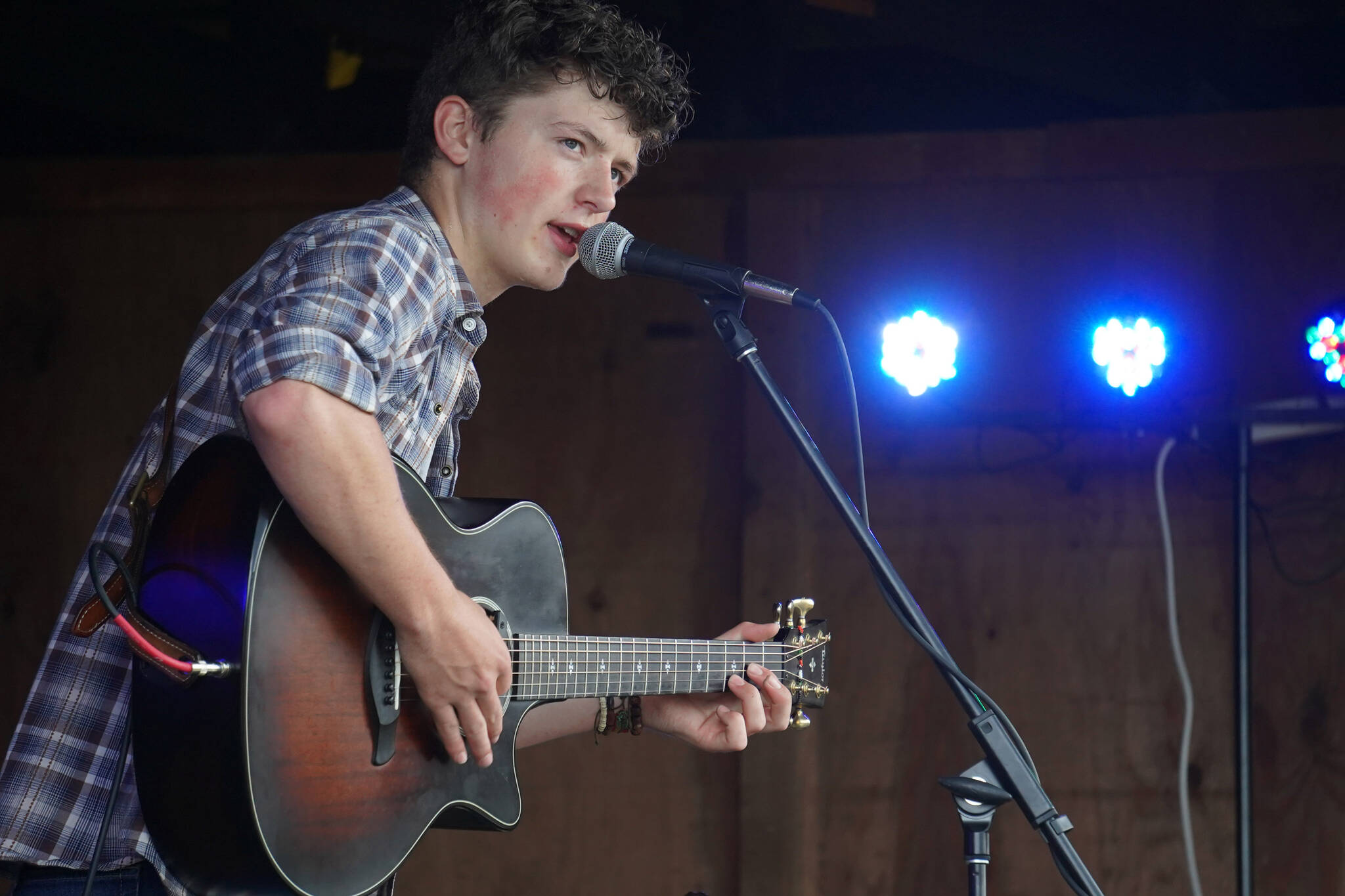 Silas Luke Jones performs on the Ocean Stage at the Kenai Peninsula Fair in Ninilchik, Alaska, on Friday, Aug. 11, 2023. (Jake Dye/Peninsula Clarion)