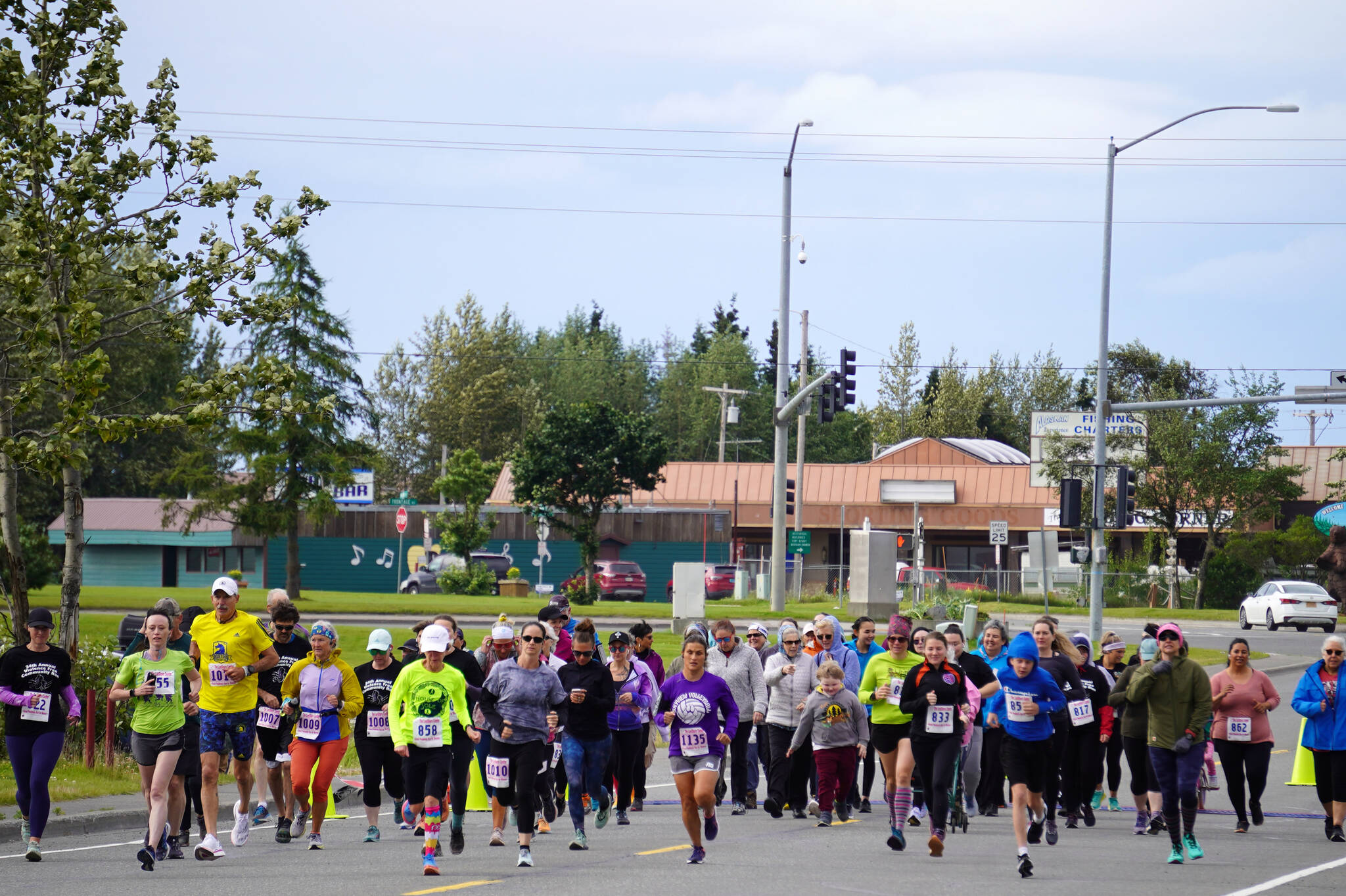 Participants of the 34th Annual Kenai Peninsula Violence Free Community Run set out in Kenai, Alaska, on Saturday, Aug. 12, 2023. (Jake Dye/Peninsula Clarion)