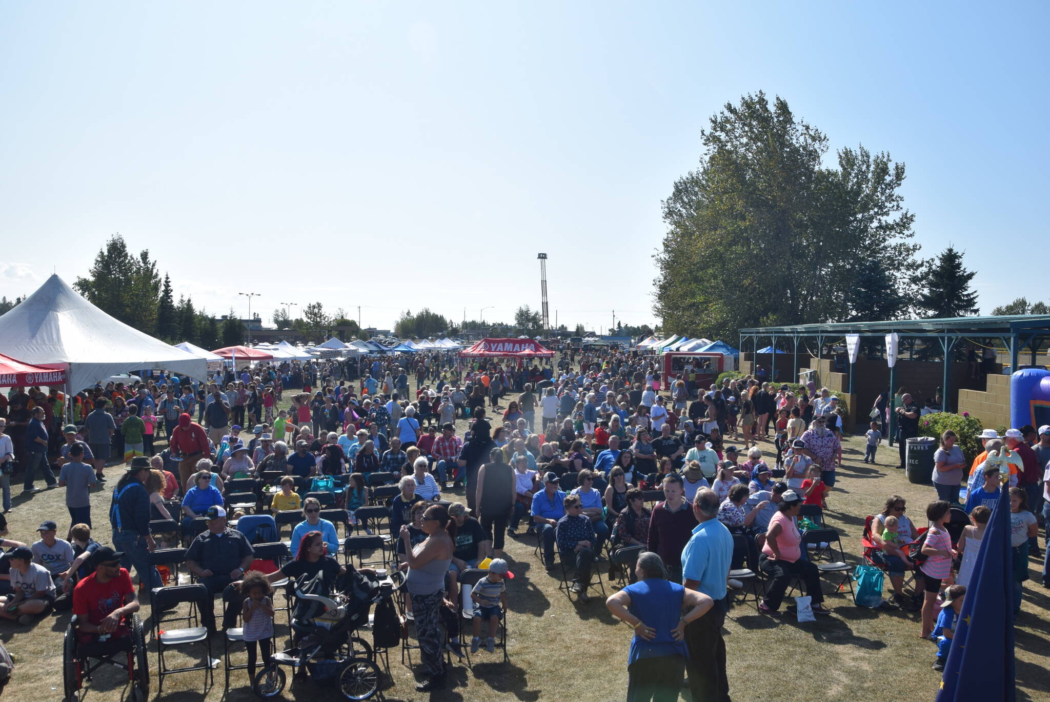 The crowd can be seen from the main stage at Kenai’s Industry Appreciation Day at the Kenai Park Strip on Aug. 24, 2019. (Photo by Brian Mazurek/Peninsula Clarion)