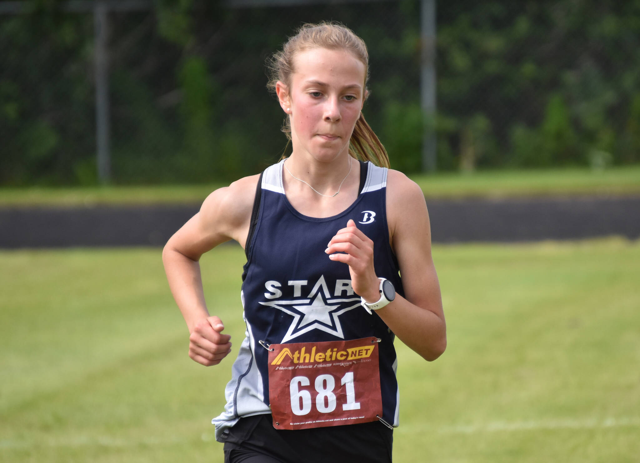 Soldotna sophomore Tania Boonstra runs to victory in the freshman-sophomore girls race at the Class Races on Monday, Aug. 14, 2023, at Nikiski High School in Nikiski, Alaska. (Photo by Jeff Helminiak/Peninsula Clarion)