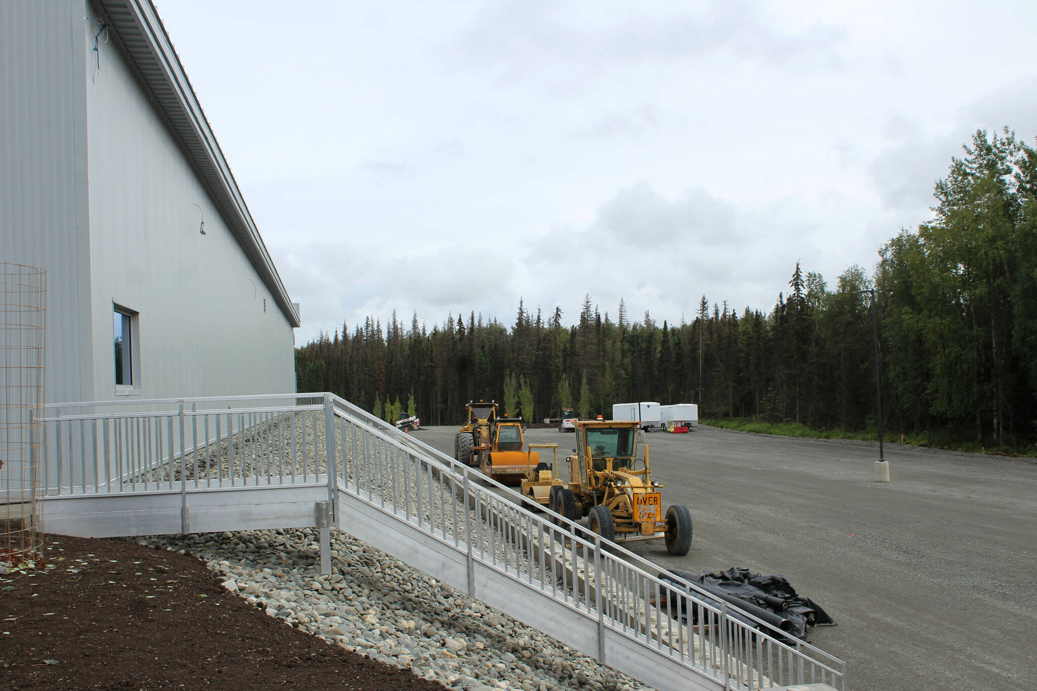 Bulldozers sit near newly leveled earth at Kendall’s new service facility and dealership on Wednesday, Aug. 17, 2023, in Soldotna, Alaska. (Ashlyn O’Hara/Peninsula Clarion)