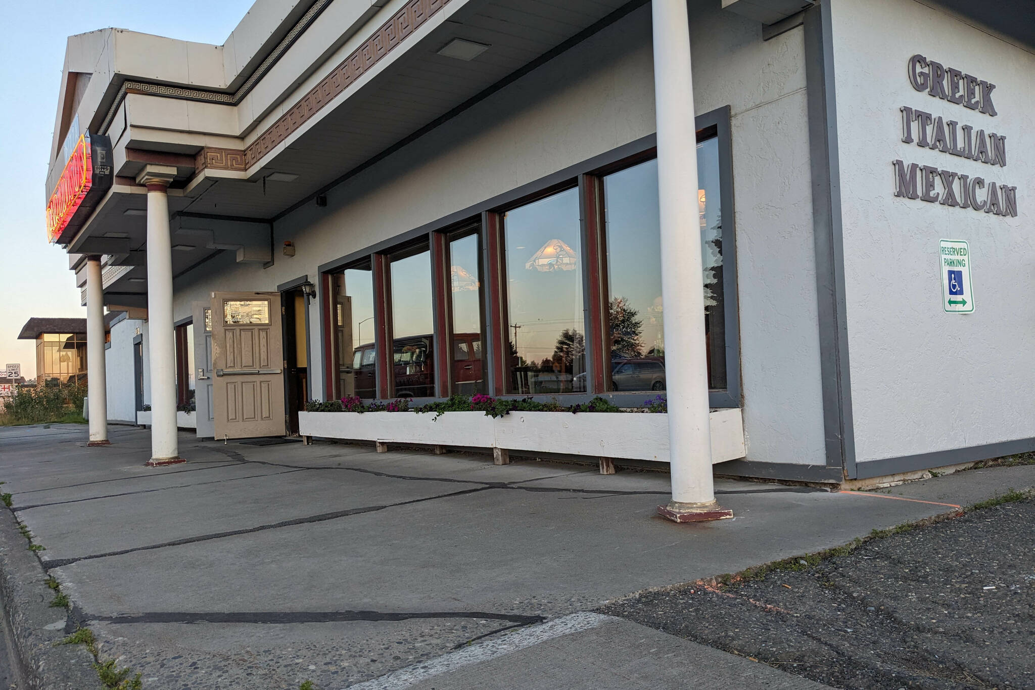 The sidewalk in front of Paradiso’s Restaurant shows cracks on Thursday, Aug. 17, 2023, in Kenai, Alaska. (Photo by Erin Thompson/Peninsula Clarion)