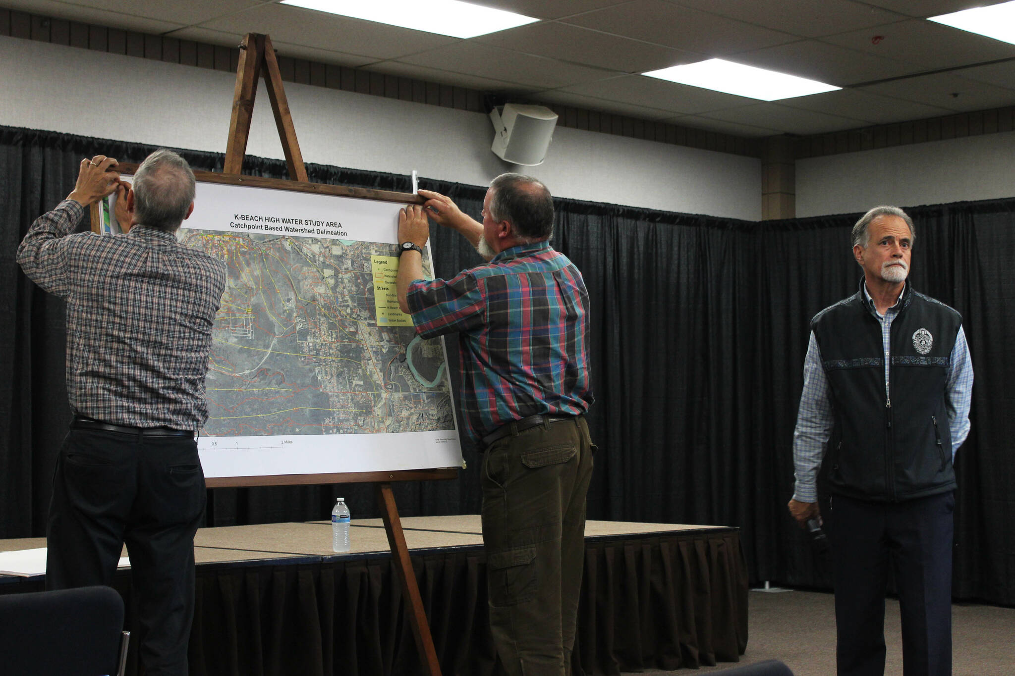 Peter Micciche, right, fields questions about flood problems along Kalifornsky Beach Road from attendees during a public meeting on Thursday, Aug. 17, 2023, in Soldotna, Alaska. (Ashlyn O’Hara/Peninsula Clarion)