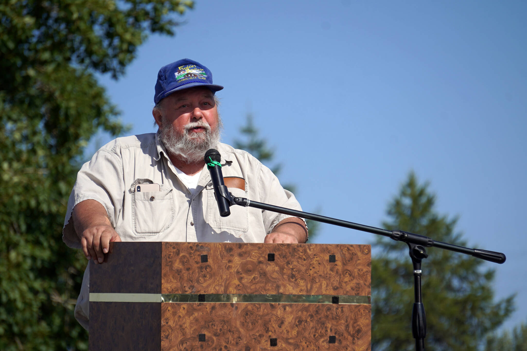 Freddie Pollard Sr. speaks after receiving the Don Gilman Outstanding Service to the Community Award during Industry Appreciation Day festivities at the Kenai softball greenstrip on Saturday, Aug. 19, 2023. (Jake Dye/Peninsula Clarion)
