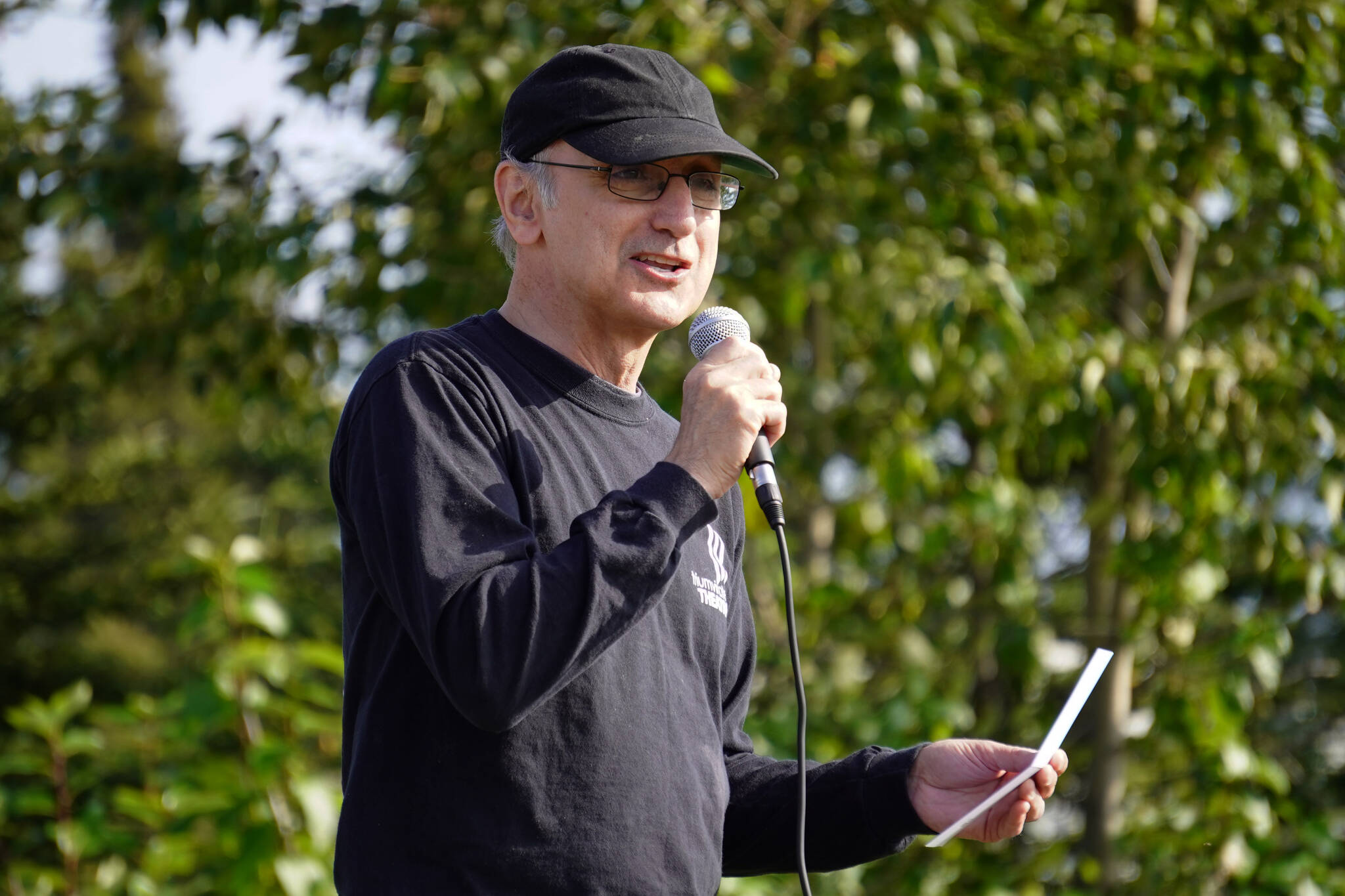 Triumvirate Theatre President Joe Rizzo speaks during a ceremonial groundbreaking for the future home of Triumvirate Theatre at Daubenspeck Family Park in Kenai, Alaska, on Saturday, Aug. 19, 2023. (Jake Dye/Peninsula Clarion)