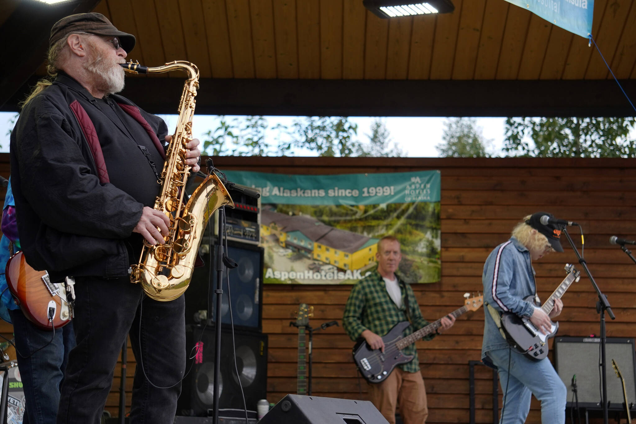 Bob Mabrey, Kent Peterson and Ray Mabrey perform as part of Riverfront Gang at Soldotna Creek Park in Soldotna, Alaska, on Wednesday, Aug. 23, 2023. (Jake Dye/Peninsula Clarion)