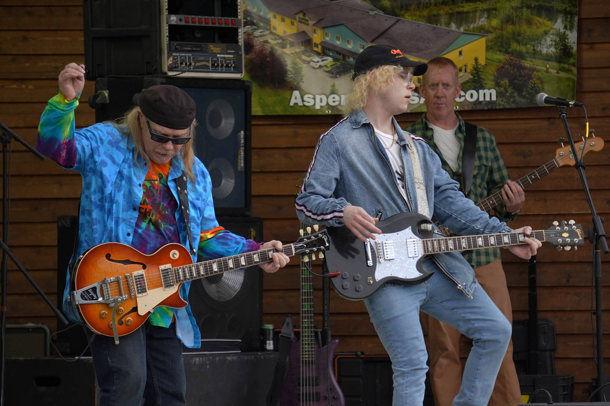 Bill Mabrey, Ray Mabrey and Kent Peterson perform as part of Riverfront Gang at Soldotna Creek Park in Soldotna, Alaska, on Wednesday, Aug. 23, 2023. (Jake Dye/Peninsula Clarion)