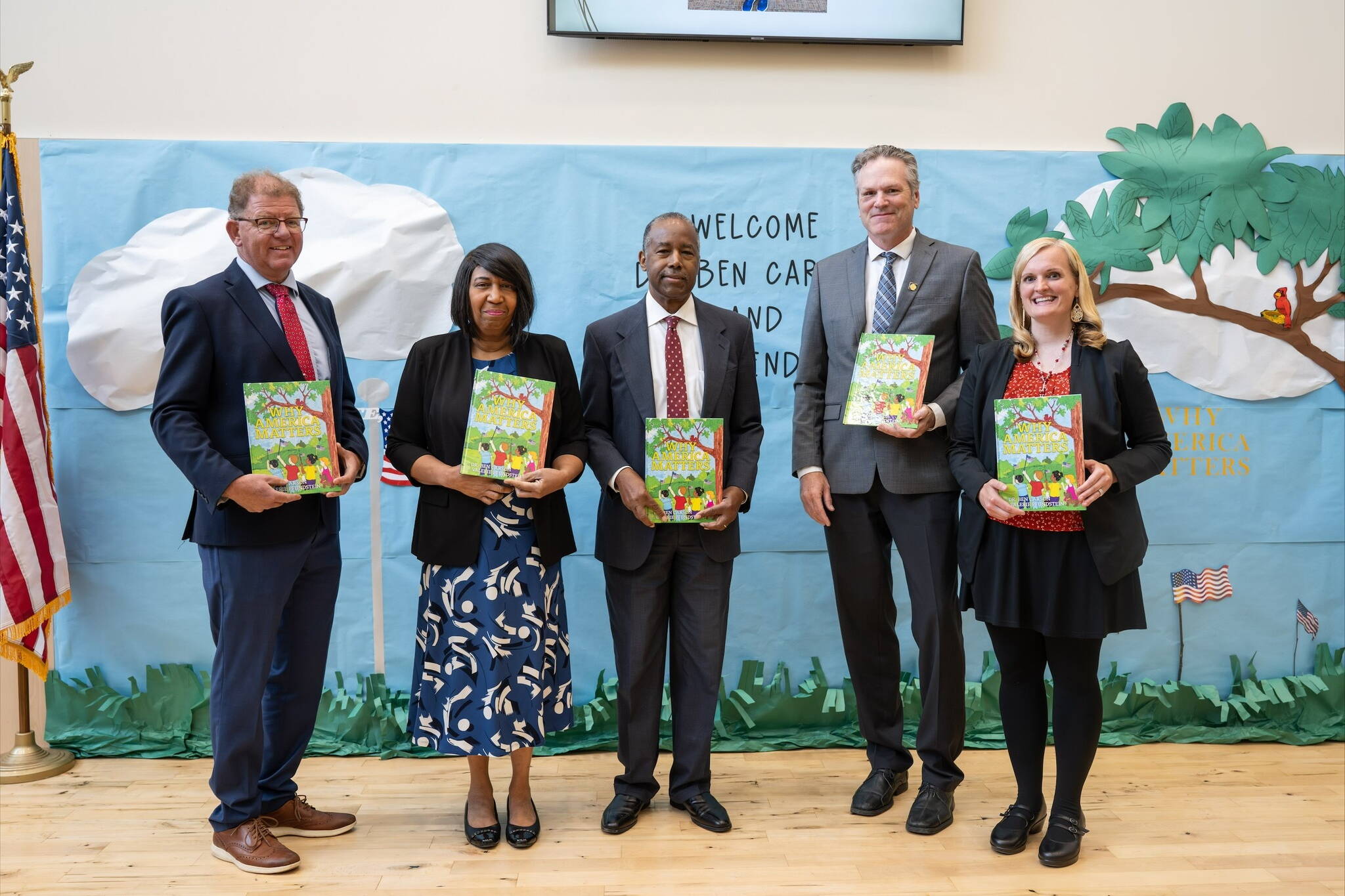 Ben Carson (center) visits Iditarod Elementary School in Wasilla with Gov. Mike Dunleavy (to Carson’s right) on Tuesday. (Official photo from the Office of the Governor)