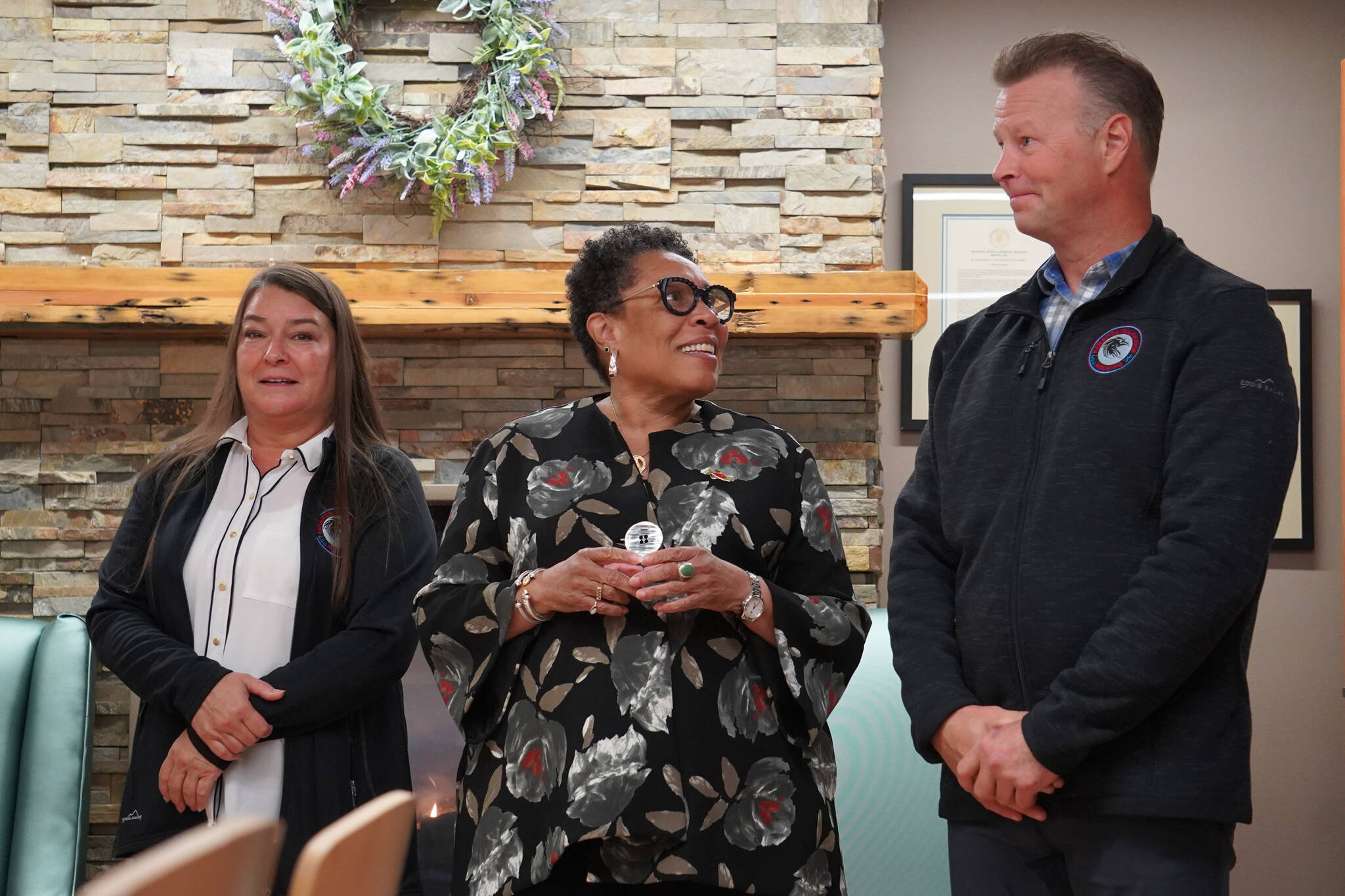 U.S. Department of Housing and Urban Development Secretary Marcia L. Fudge, center, is joined by Kenaitze Indian Tribe Tribal Council Chair Ronette Stanton and Kenaitze/Salamatof Tribally Designated Housing Entity Chair Kaarlo Wik on a visit to the Tyotkas Elder Center in Kenai, Alaska, on Wednesday, Aug. 30, 2023. (Jake Dye/Peninsula Clarion)