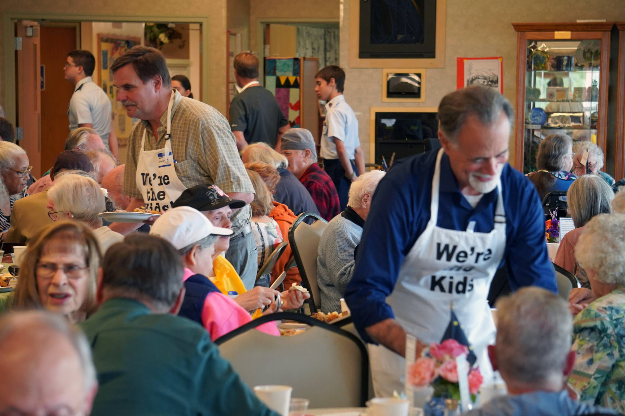 “The Kids” serve lunch to attendees of the Old Timer’s Luncheon at the Kenai Senior Center in Kenai, Alaska, on Thursday, Aug. 31, 2023. (Jake Dye/Peninsula Clarion)