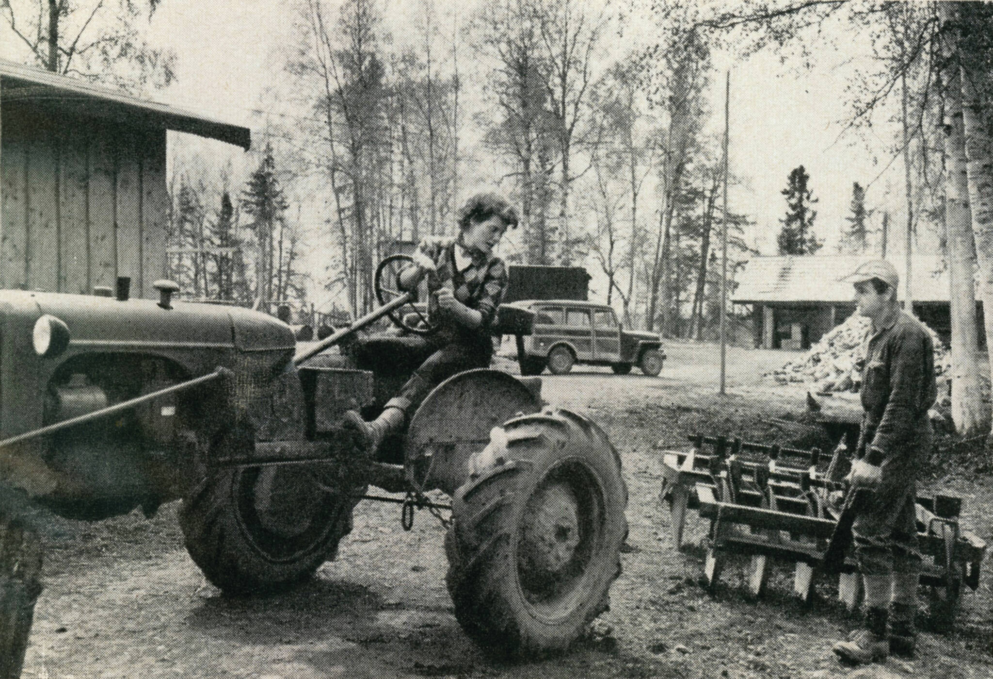 1954 photo by Bob and Ira Spring for Better Homes & Garden magazine
Rusty Lancashire backs up the family tractor so her husband Larry can connect it to the disc for their fields.