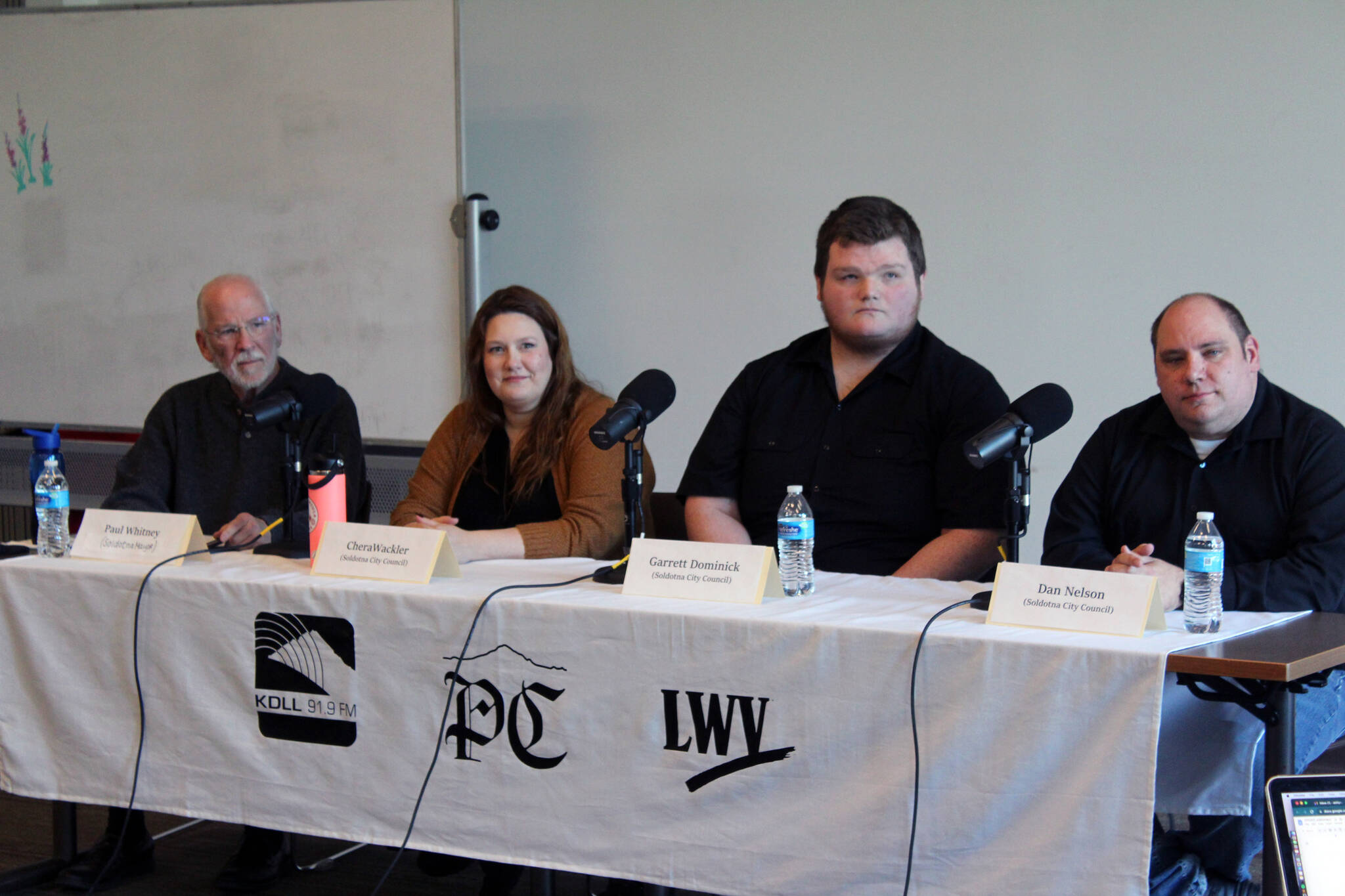 Paul Whitney, Chera Wackler, Garrett Dominick and Dan Nelson participate in a Soldotna City Council candidate forum at the Soldotna Public Library in Soldotna, Alaska, on Monday, Sept. 4, 2023. (Jake Dye/Peninsula Clarion)