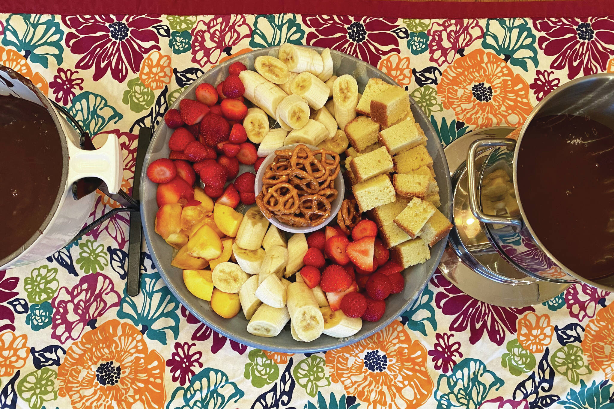 Vanilla pound cake, fruits and pretzels are prepped for a fondue celebration. (Photo by Tressa Dale/Peninsula Clarion)