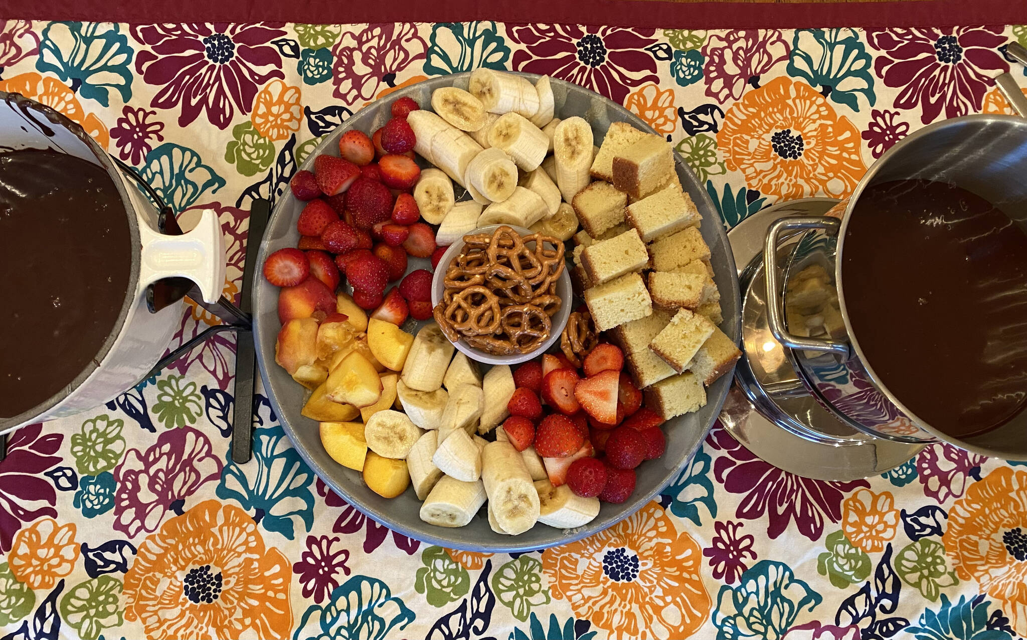 Vanilla pound cake, fruits and pretzels are prepped for a fondue celebration. (Photo by Tressa Dale/Peninsula Clarion)