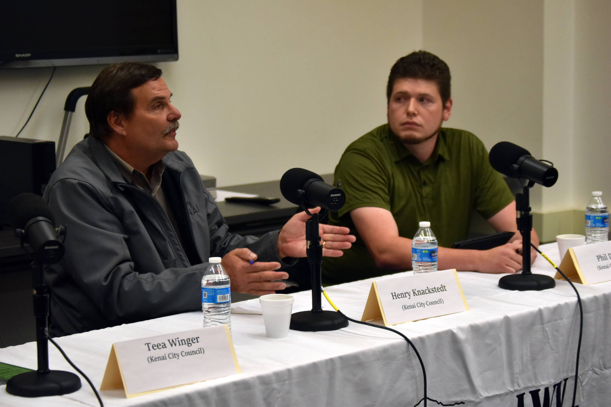 Henry Knackstedt and Phil Daniel participate in a Kenai City Council candidate forum at the Kenai Community Library in Kenai, Alaska, on Thursday, Sept. 7, 2023. (Jake Dye/Peninsula Clarion)