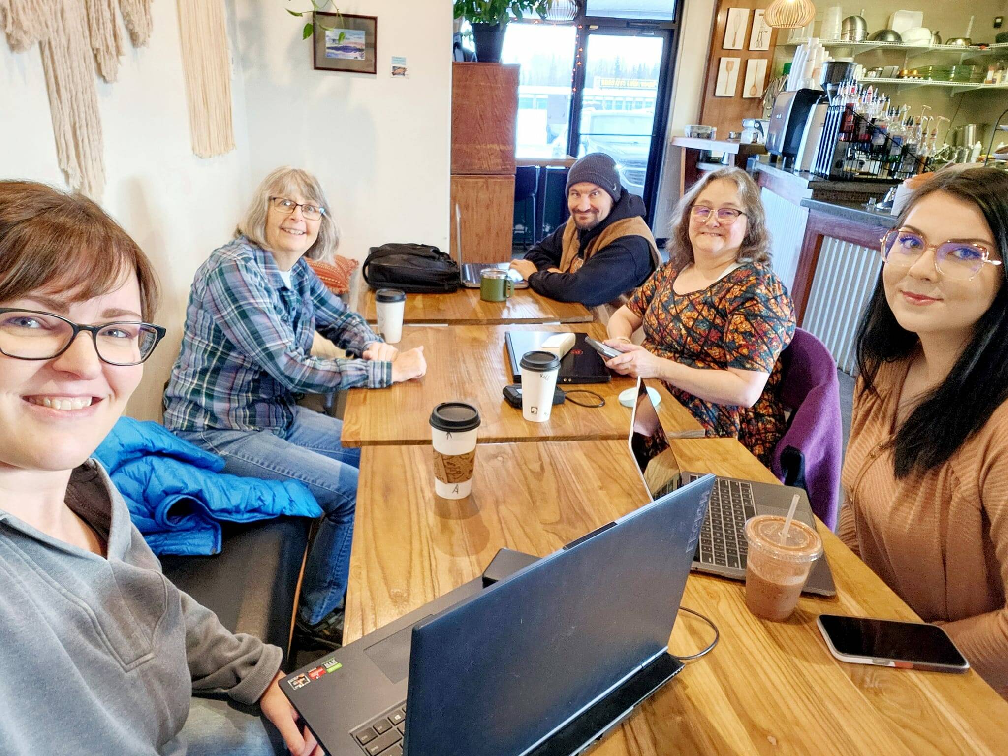 Members of Kenai Camera and Coffee meet at a local coffee shop. (photo courtesy Colette Gilmour)