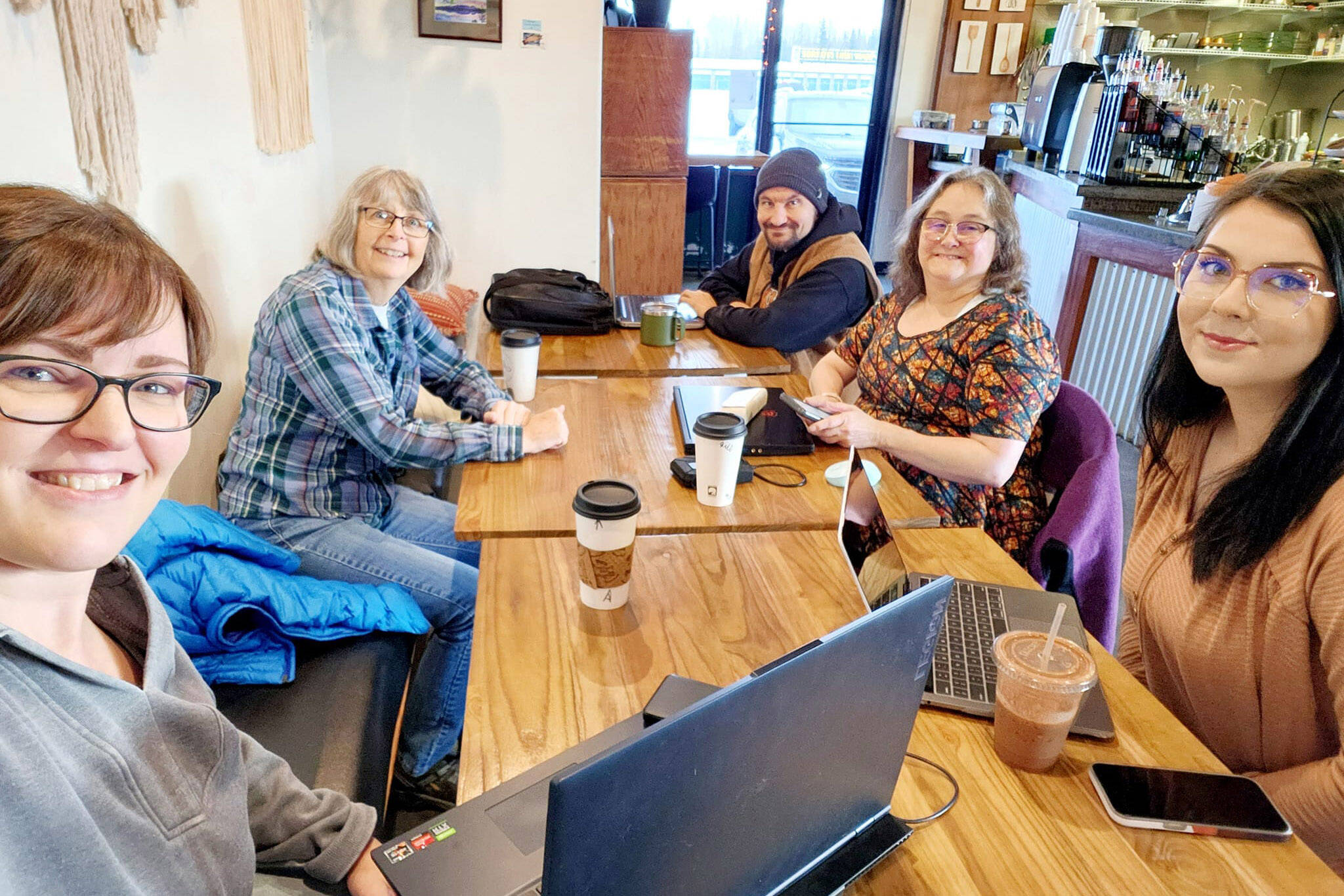 Members of Kenai Camera and Coffee meet at a local coffee shop. (photo courtesy Colette Gilmour)