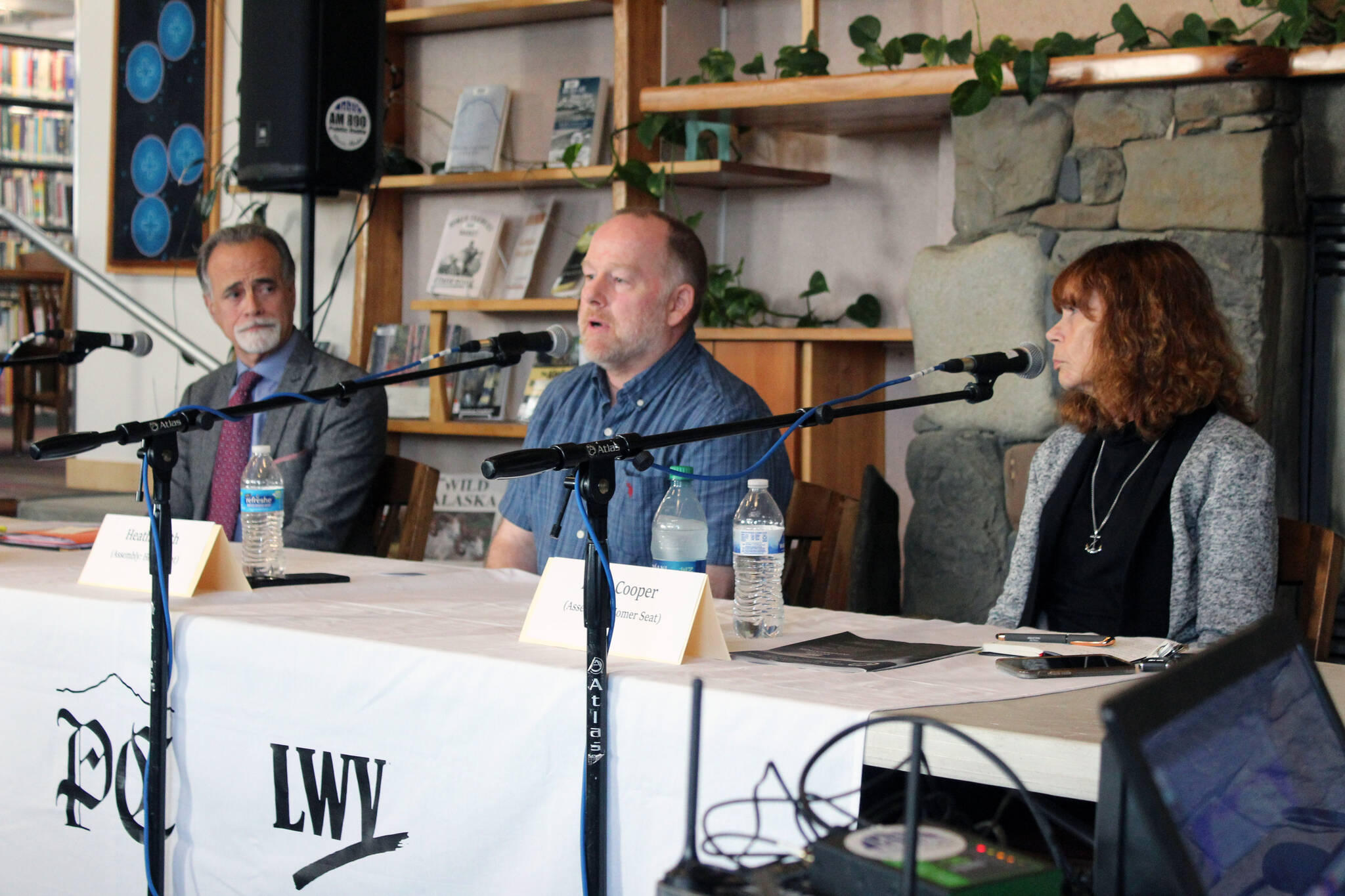 Kenai Peninsula Borough Mayor Peter Micciche and Kenai Peninsula Borough Assembly candidates Heath Smith and Kelly Cooper participate in a Kenai Peninsula Borough Assembly Forum at Homer Public Library in Homer, Alaska, on Thursday, Sept. 14, 2023. (Jake Dye/Peninsula Clarion)