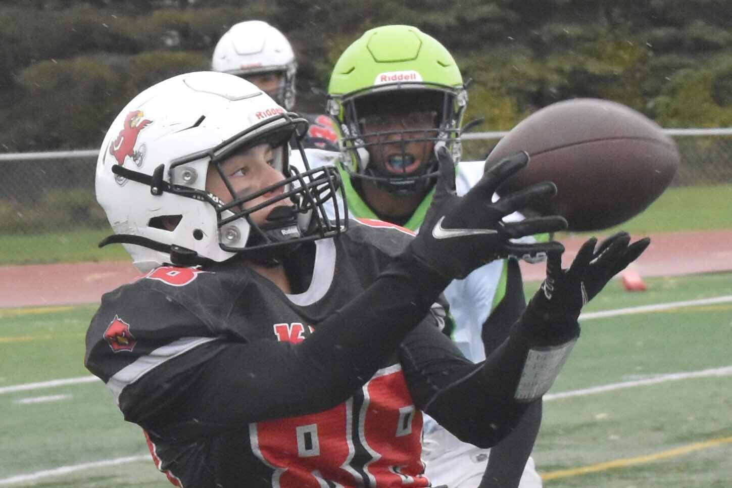 Kenai Central's Sawyer Vann catches a touchdown pass against Redington on Saturday, Sept. 16, 2023, at Ed Hollier Field at Kenai Central High School in Kenai, Alaska. (Photo by Jeff Helminiak/Peninsula Clarion)