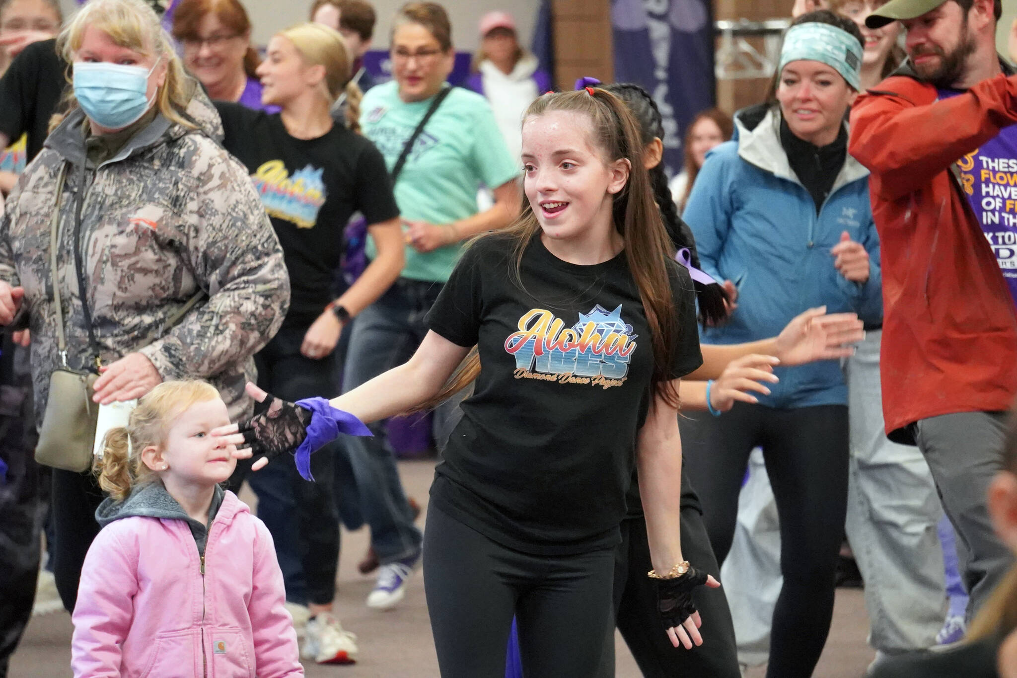 Dancers from the Diamond Dance Project perform ahead of the Walk to End Alzheimer’s at the Soldotna Regional Sports Complex in Soldotna, Alaska, on Saturday, Sept. 16, 2023. (Jake Dye/Peninsula Clarion)