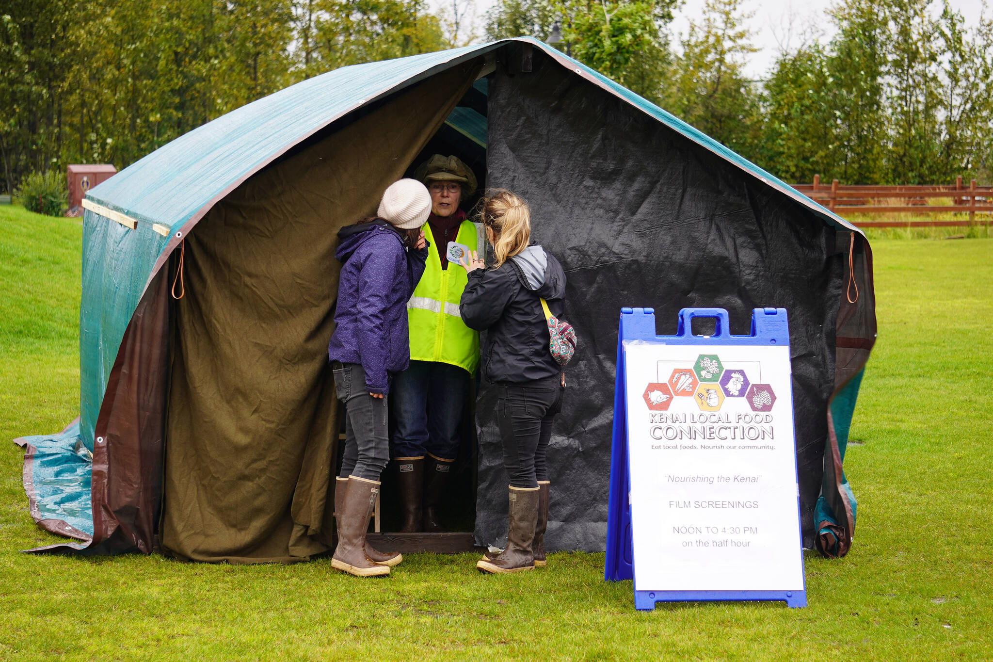A tent hosts screenings of “Nourishing the Kenai” during the Harvest Moon Local Food Festival at Soldotna Creek Park in Soldotna, Alaska, on Saturday, Sept. 16, 2023. (Jake Dye/Peninsula Clarion)