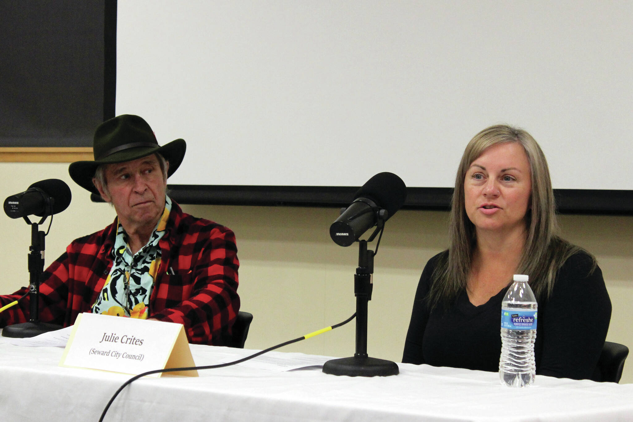 Jake Dye/Peninsula Clarion
Brad Snowden and Julie Crites participate in a Seward City Council candidate forum at the Seward Community Library in Seward on Thursday.