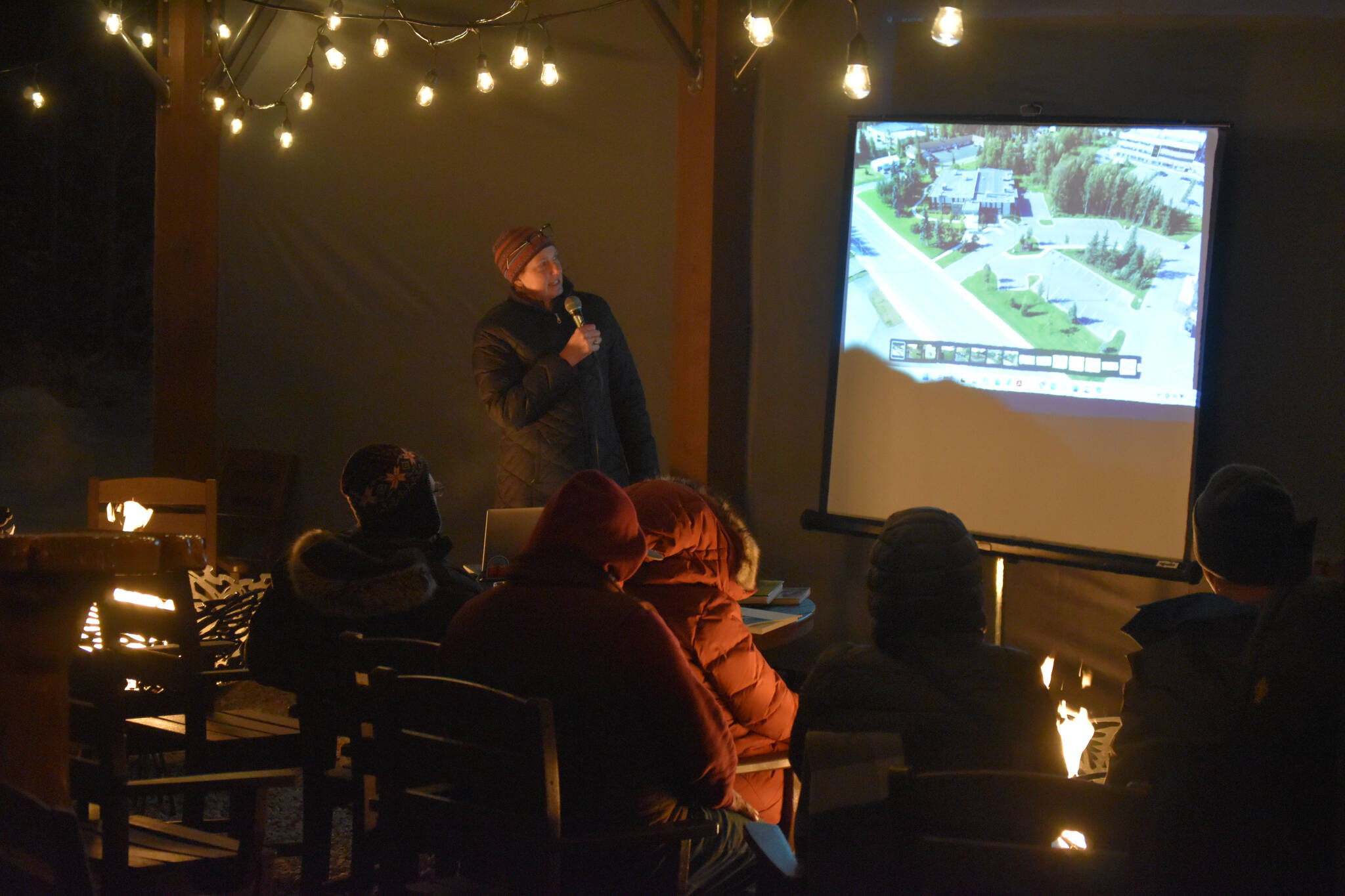 Architect Nancy Casey speaks in front of a small gathering at the Fireside Chat presented by the Kenai Watershed Forum on Nov. 30, 2022, at Kenai River Brewing in Soldotna, Alaska. (Jake Dye/Peninsula Clarion)