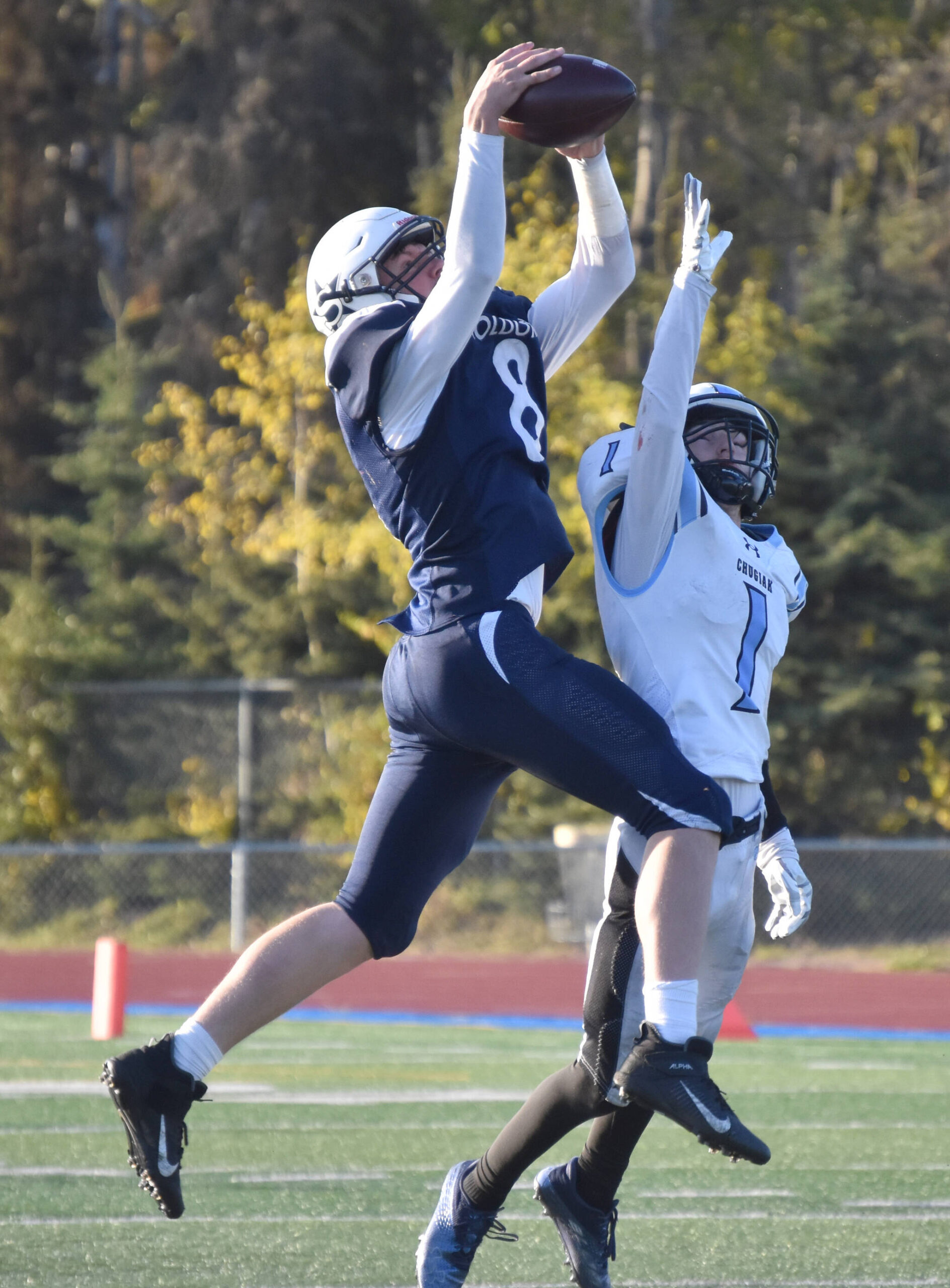 Soldotna’s Andrew Pieh intercepts a pass intended for Chugiak’s Kaden Lockwood on Friday, Sept. 22, 2023, at Justin Maile Field at Soldotna High School in Soldotna, Alaska. (Photo by Jeff Helminiak/Peninsula Clarion)