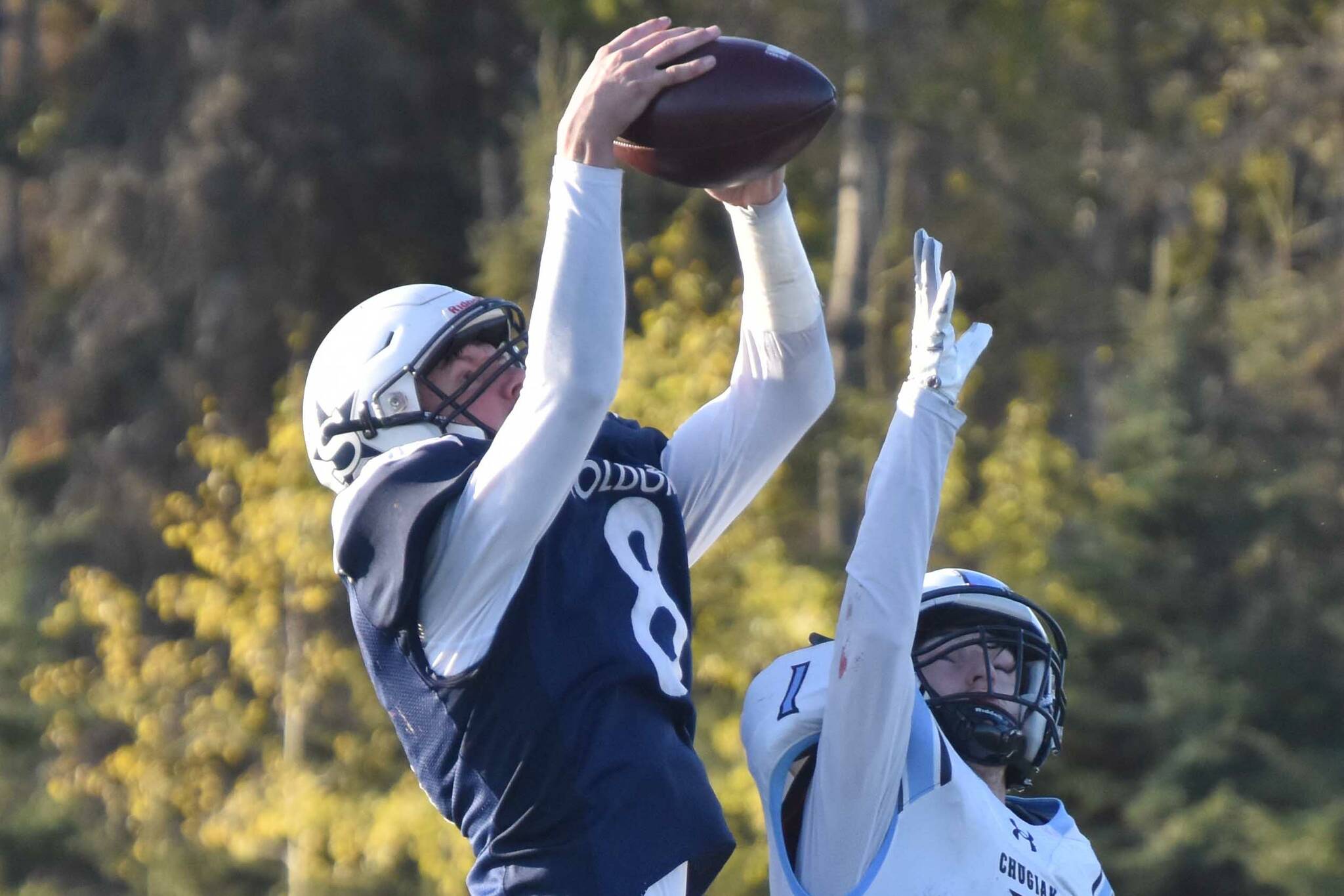 Soldotna's Andrew Pieh intercepts a pass intended for Chugiak's Kaden Lockwood on Friday, Sept. 22, 2023, at Justin Maile Field at Soldotna High School in Soldotna, Alaska. (Photo by Jeff Helminiak/Peninsula Clarion)