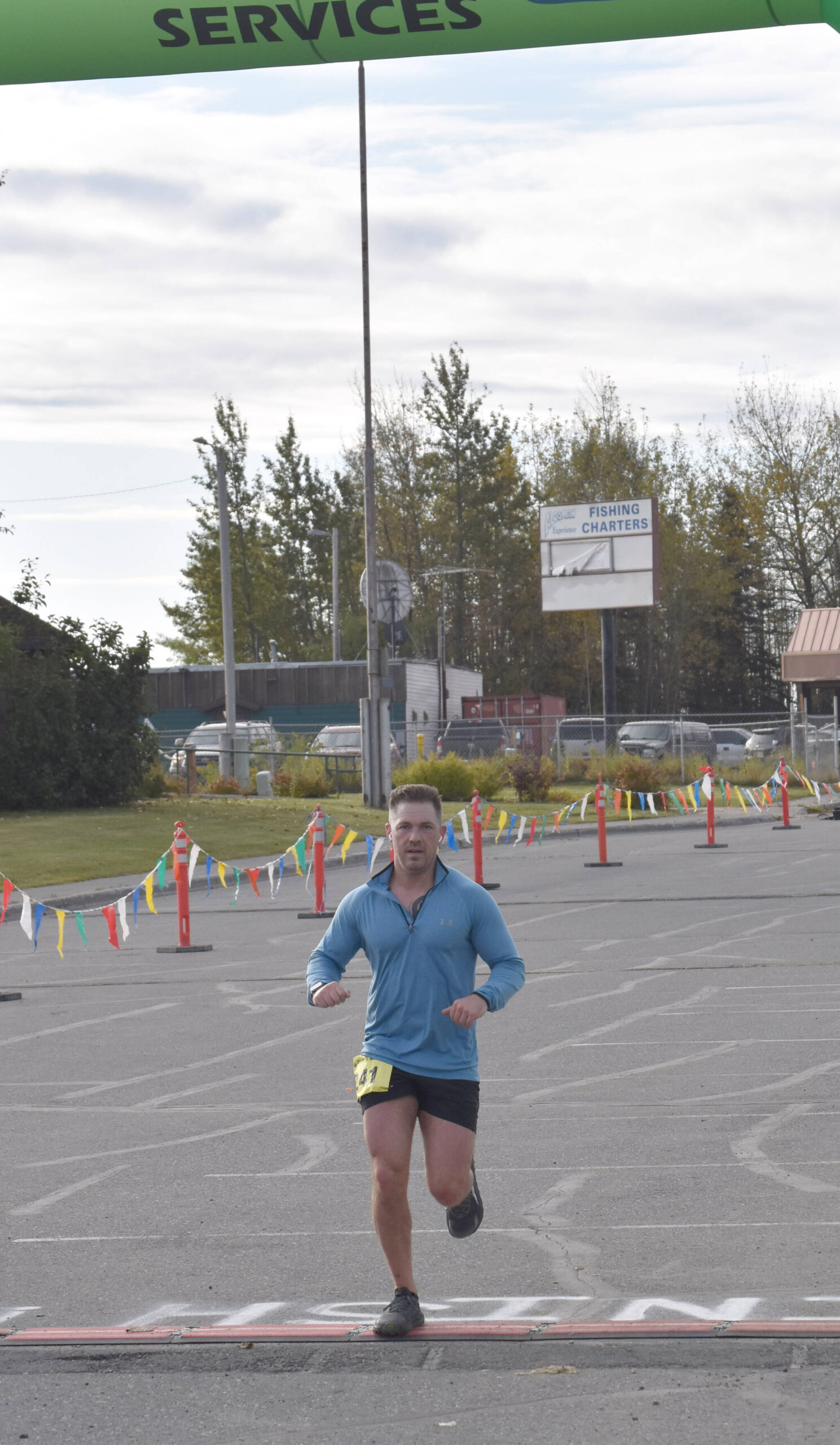 Rob Parrish of Kenai wins the men’s half marathon at the Kenai River Marathon on Sunday, Sept. 24, 2023, in Kenai, Alaska. (Photo by Jeff Helminiak/Peninsula Clarion)