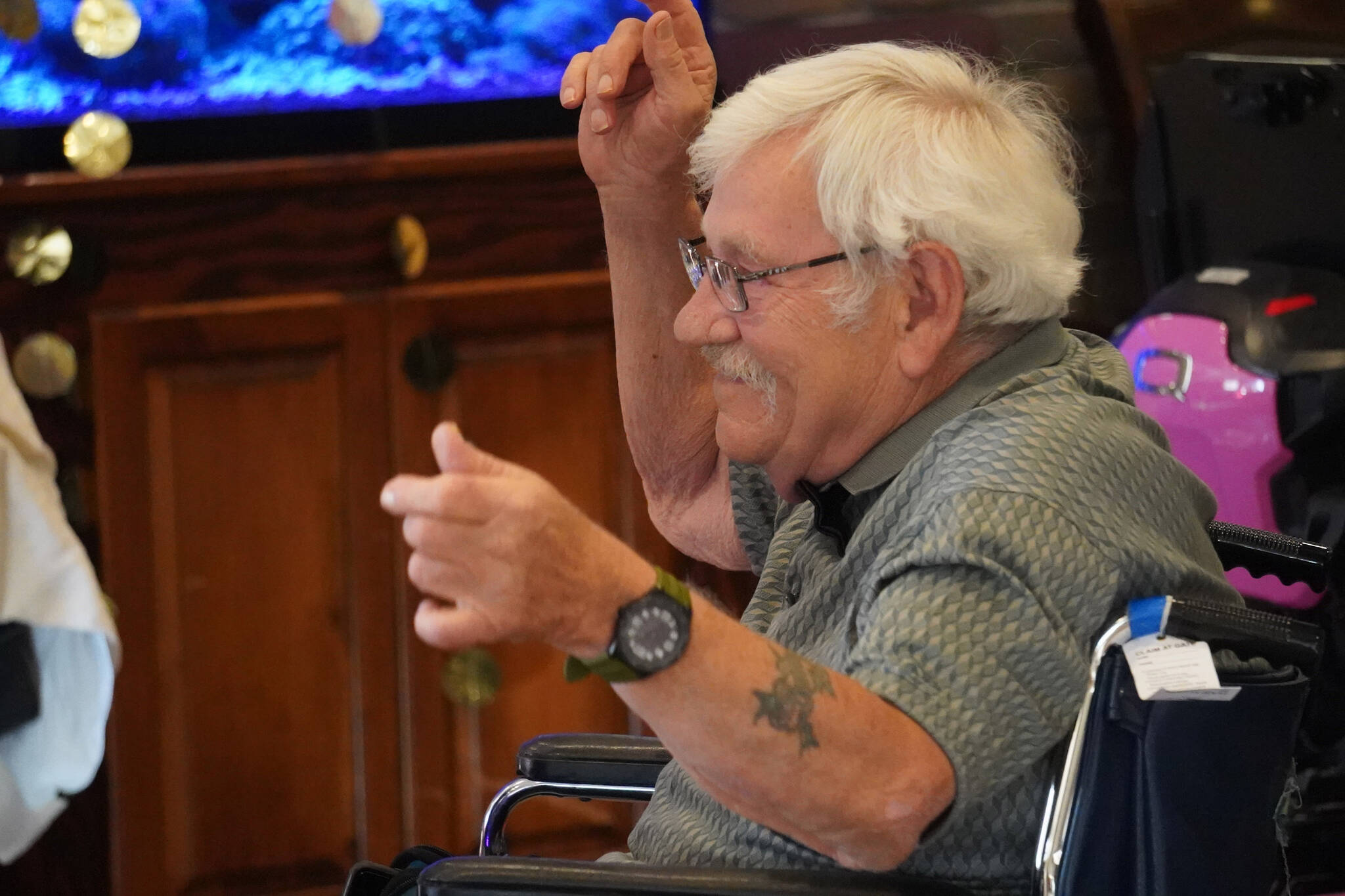 Dennis Borbon hits the dance floor at the 2023 High Roller Senior Prom at Aspen Creek Senior Living in Kenai, Alaska, on Friday, Sept. 22, 2023. (Jake Dye/Peninsula Clarion)