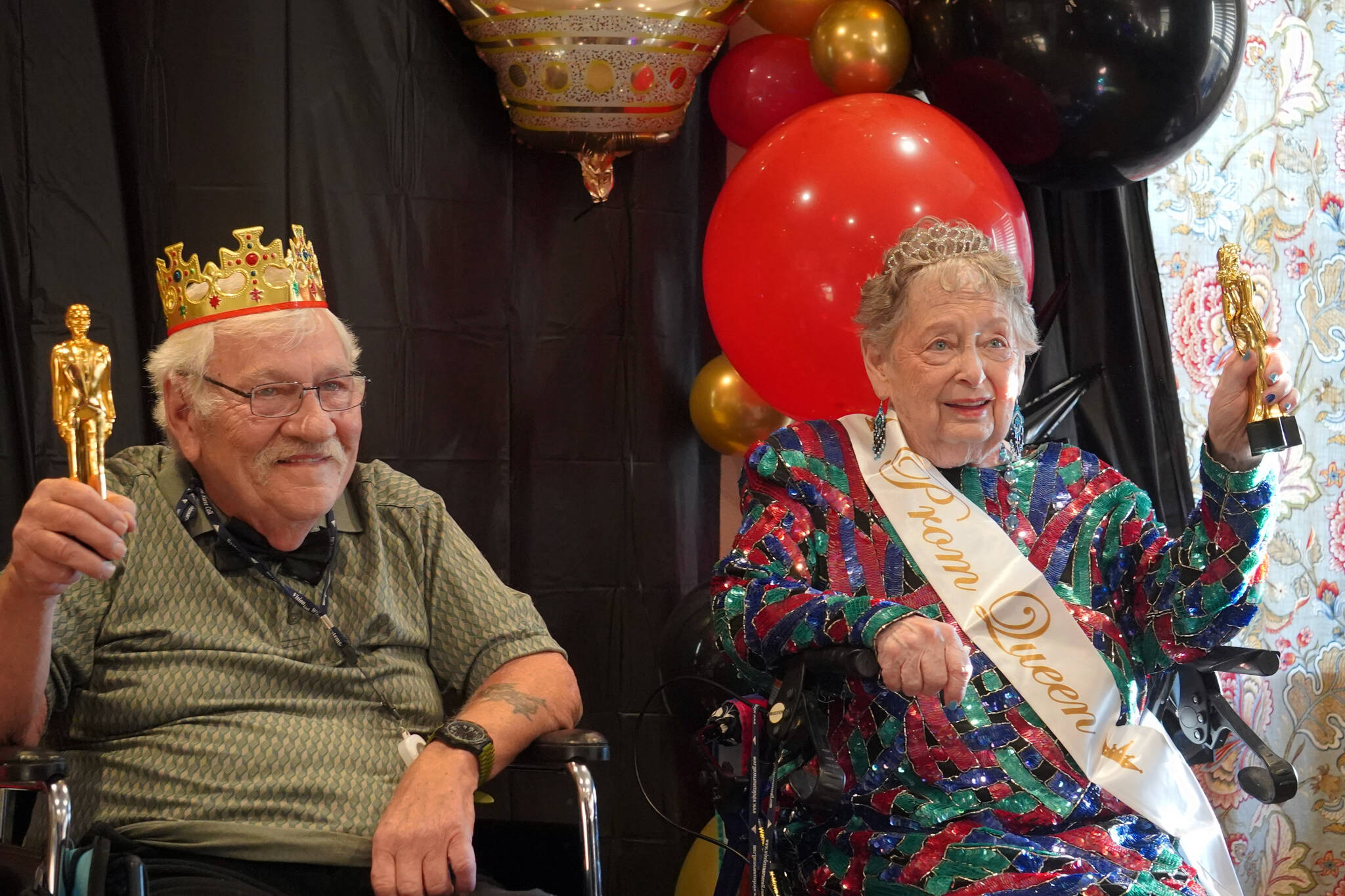 Senior Prom King and Queen Dennis Borbon and Lorraine Ashcraft are crowned at the 2023 High Roller Senior Prom at Aspen Creek Senior Living in Kenai, Alaska, on Friday, Sept. 22, 2023. (Jake Dye/Peninsula Clarion)
