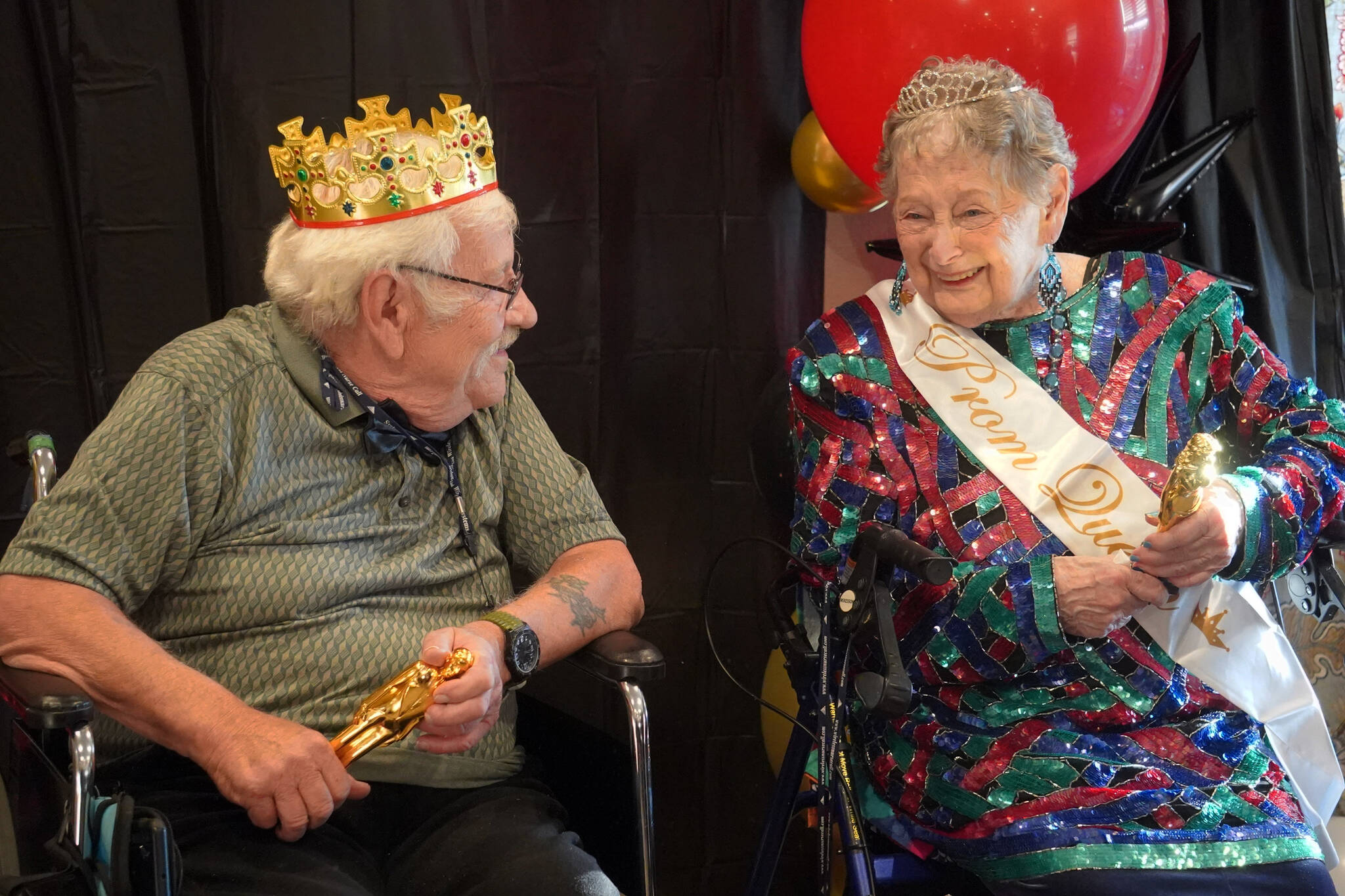 Senior Prom King and Queen Dennis Borbon and Lorraine Ashcraft are crowned at the 2023 High Roller Senior Prom at Aspen Creek Senior Living in Kenai, Alaska, on Friday, Sept. 22, 2023. (Jake Dye/Peninsula Clarion)