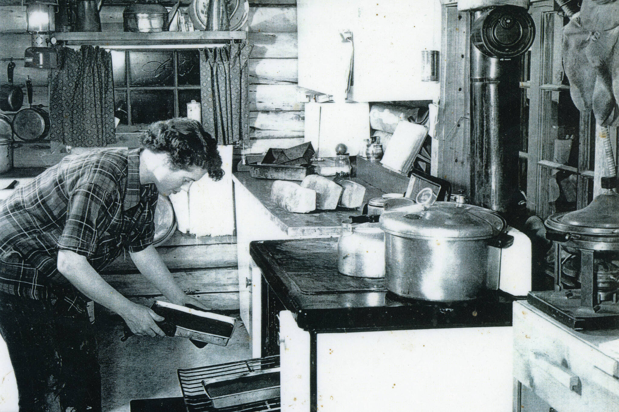 Rusty Lancashire does some baking. (1954 photo by Bob and Ira Spring for Better Homes & Garden magazine)
