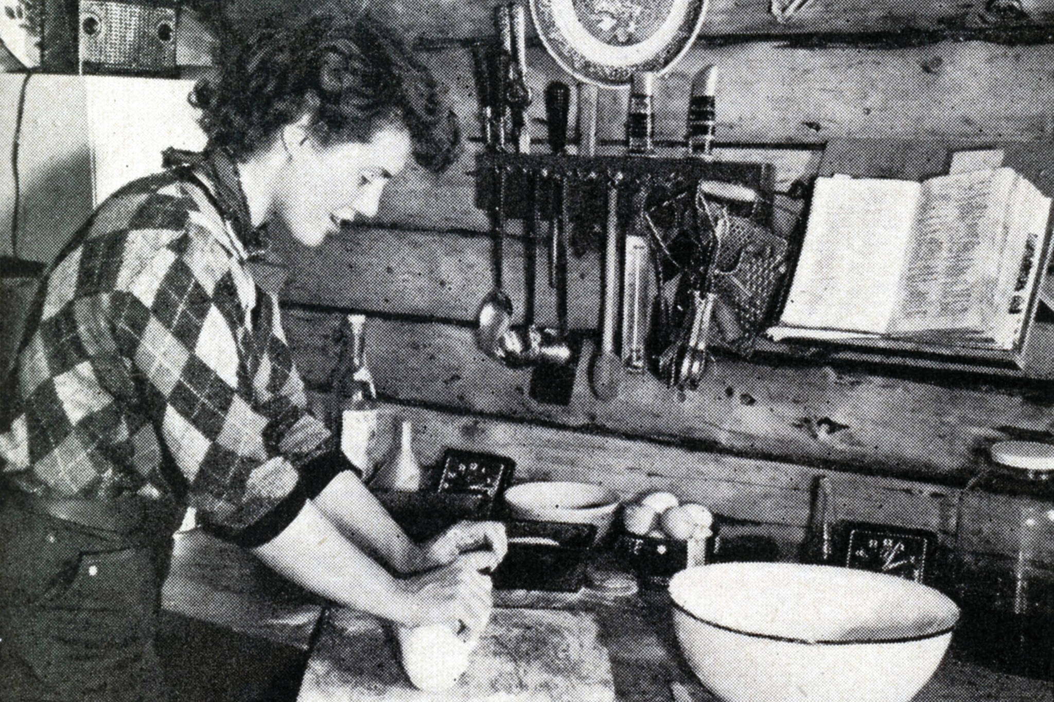 Rusty Lancashire kneads bread dough in her kitchen. (1954 photo by Bob and Ira Spring for Better Homes & Garden magazine)