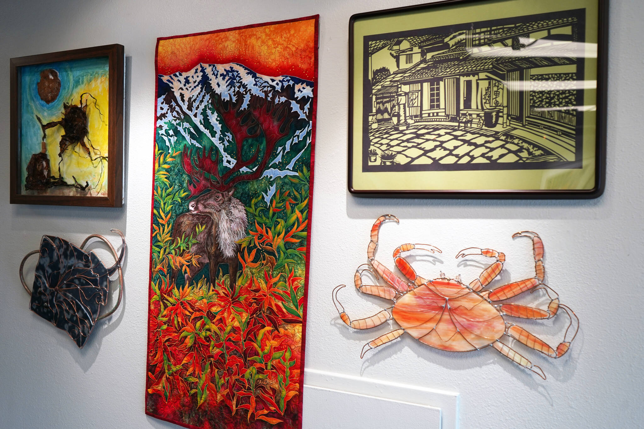 Several pieces included in the Biennial Judged Show are seen at Kenai Art Center in Kenai, Alaska, on Wednesday, Oct. 4, 2023. (Jake Dye/Peninsula Clarion)