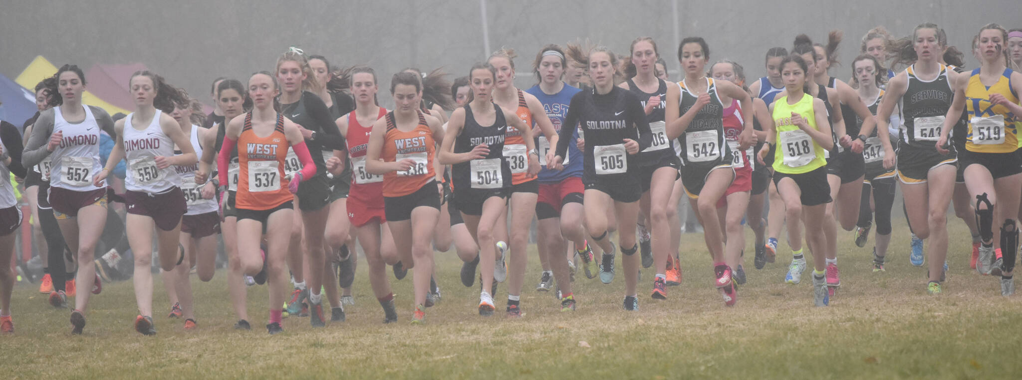 Soldotnas Tania Boonstra and Kathryn DeBardelaben lead the pack from the start Saturday, Oct. 7, 2023, in the Division I girls state cross-country race at Palmer High School in Palmer, Alaska. (Photo by Jeff Helminiak/Peninsula Clarion)