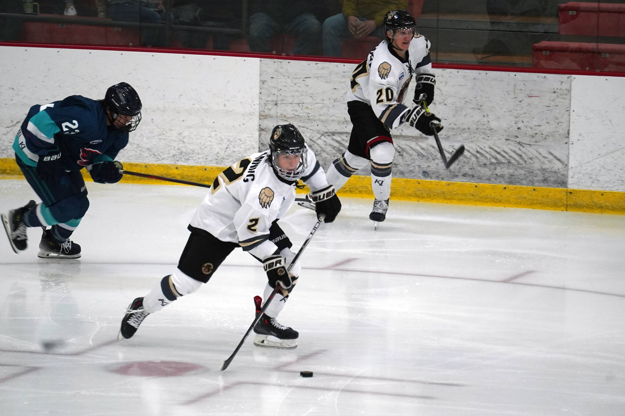 Kenai River’s Joe Manning moves with the puck, pursued by Anchorage’s Taisetsu Ushio during a hockey game at the Soldotna Regional Sports Complex in Soldotna, Alaska, on Saturday, Oct. 7, 2023. (Jake Dye/Peninsula Clarion)