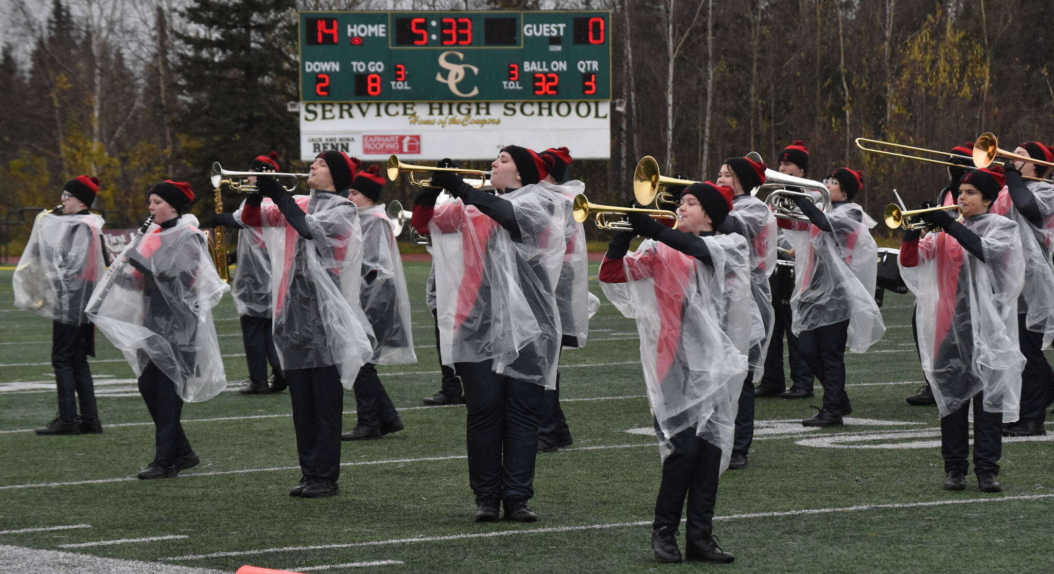 The Kenai Central marching band performs at halftime Saturday, Oct. 14, 2023, in the Division III state championship game at Service High School in Anchorage, Alaska. (Photo by Jeff Helminiak/Peninsula Clarion)