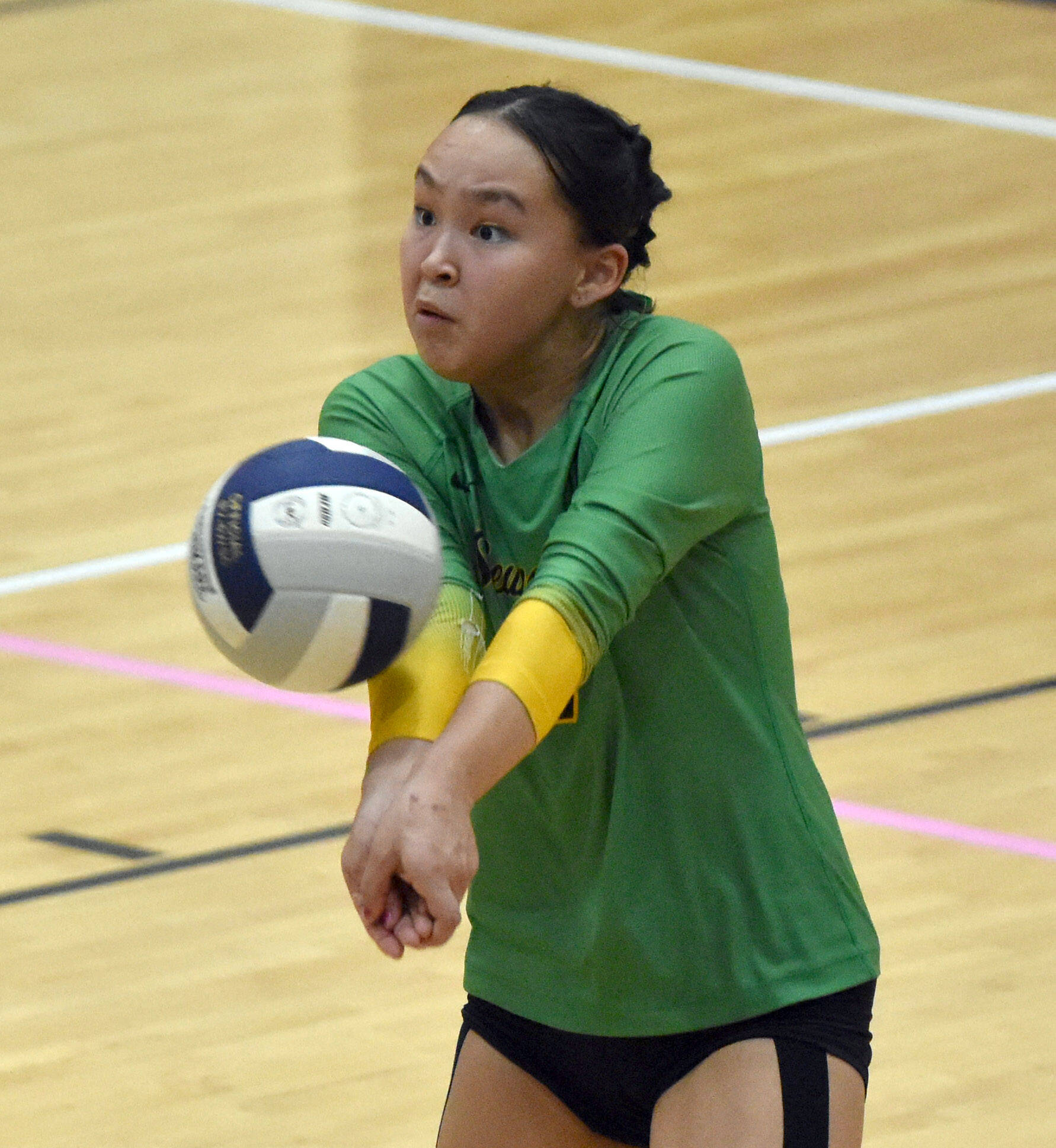 Kyana Hutchinson digs up a ball against Soldotna on Tuesday, Oct. 17, 2023, at Soldotna High School in Soldotna, Alaska. (Photo by Jeff Helminiak/Peninsula Clarion)