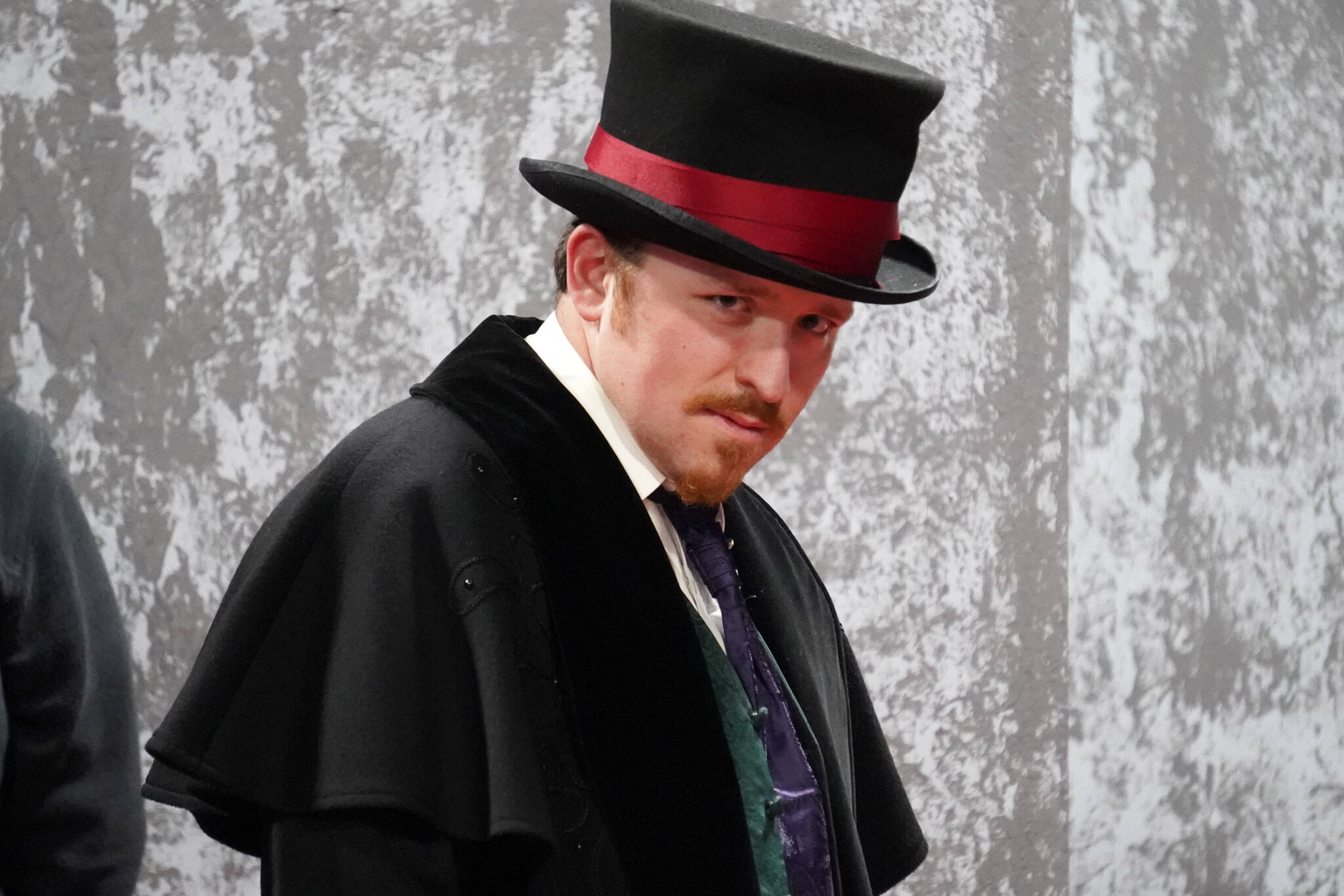 Braeden Garrett rehearses “Jekyll and Hyde: the Musical” at the Kenai Performers’ Theatre in Kenai, Alaska, on Wednesday, Oct. 18, 2023. (Jake Dye/Peninsula Clarion)