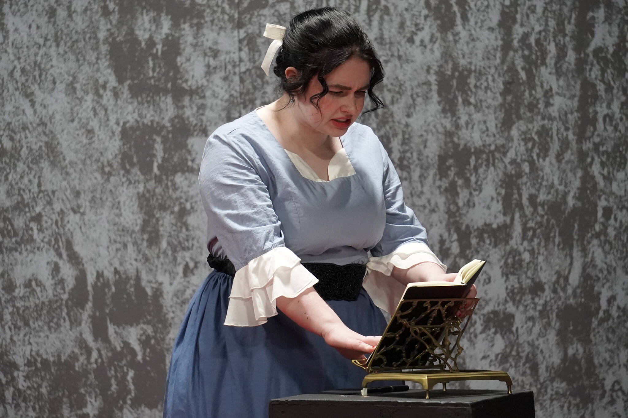 Charli Byrd rehearses “Jekyll and Hyde: the Musical” at the Kenai Performers’ Theatre in Kenai, Alaska, on Wednesday, Oct. 18, 2023. (Jake Dye/Peninsula Clarion)