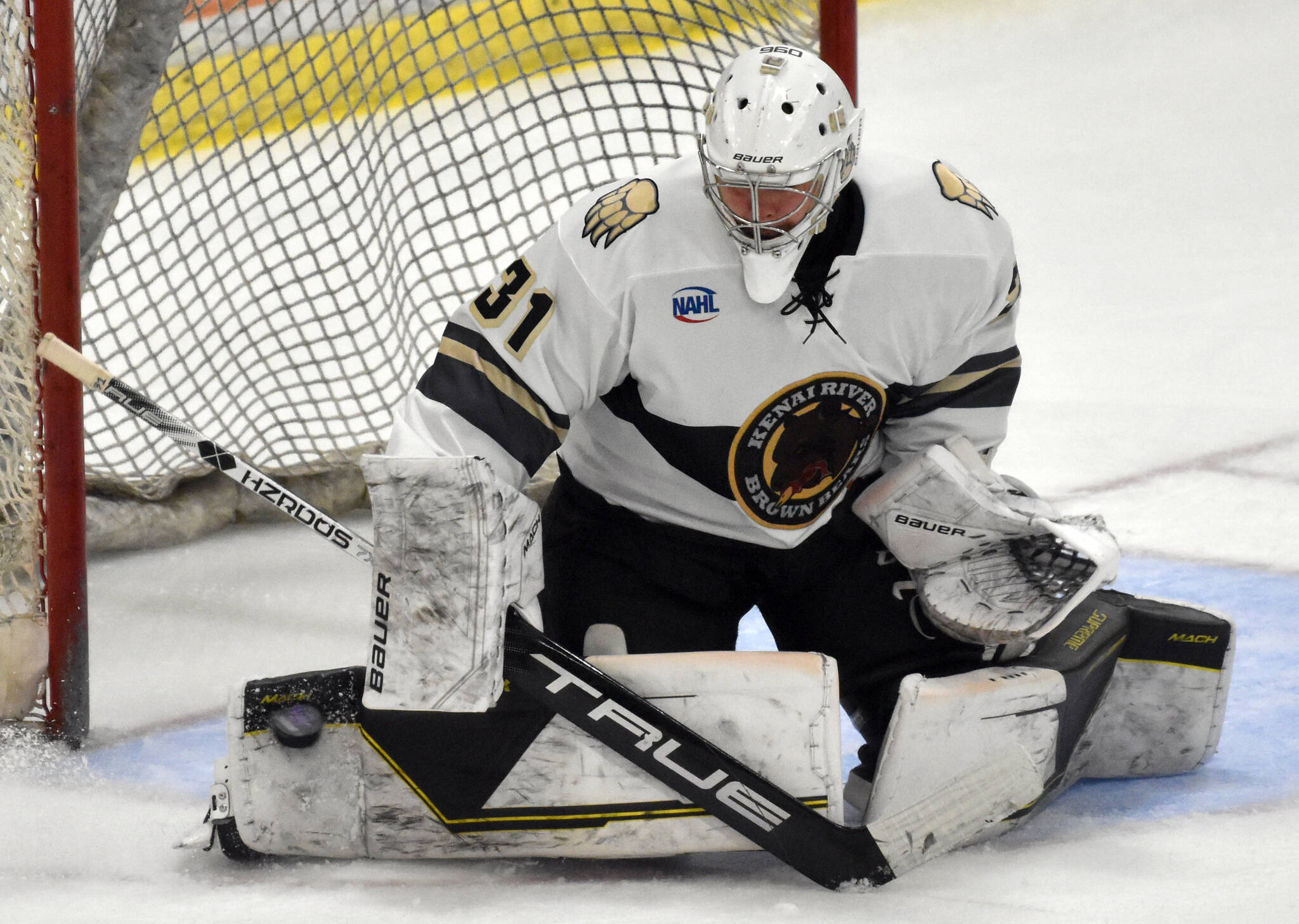 Peter Wickstrom Stumer of the Brown Bears makes a save Friday, Oct. 20, 2023, at the Soldotna Regional Sports Complex in Soldotna, Alaska. (Photo by Jeff Helminiak/Peninsula Clarion)