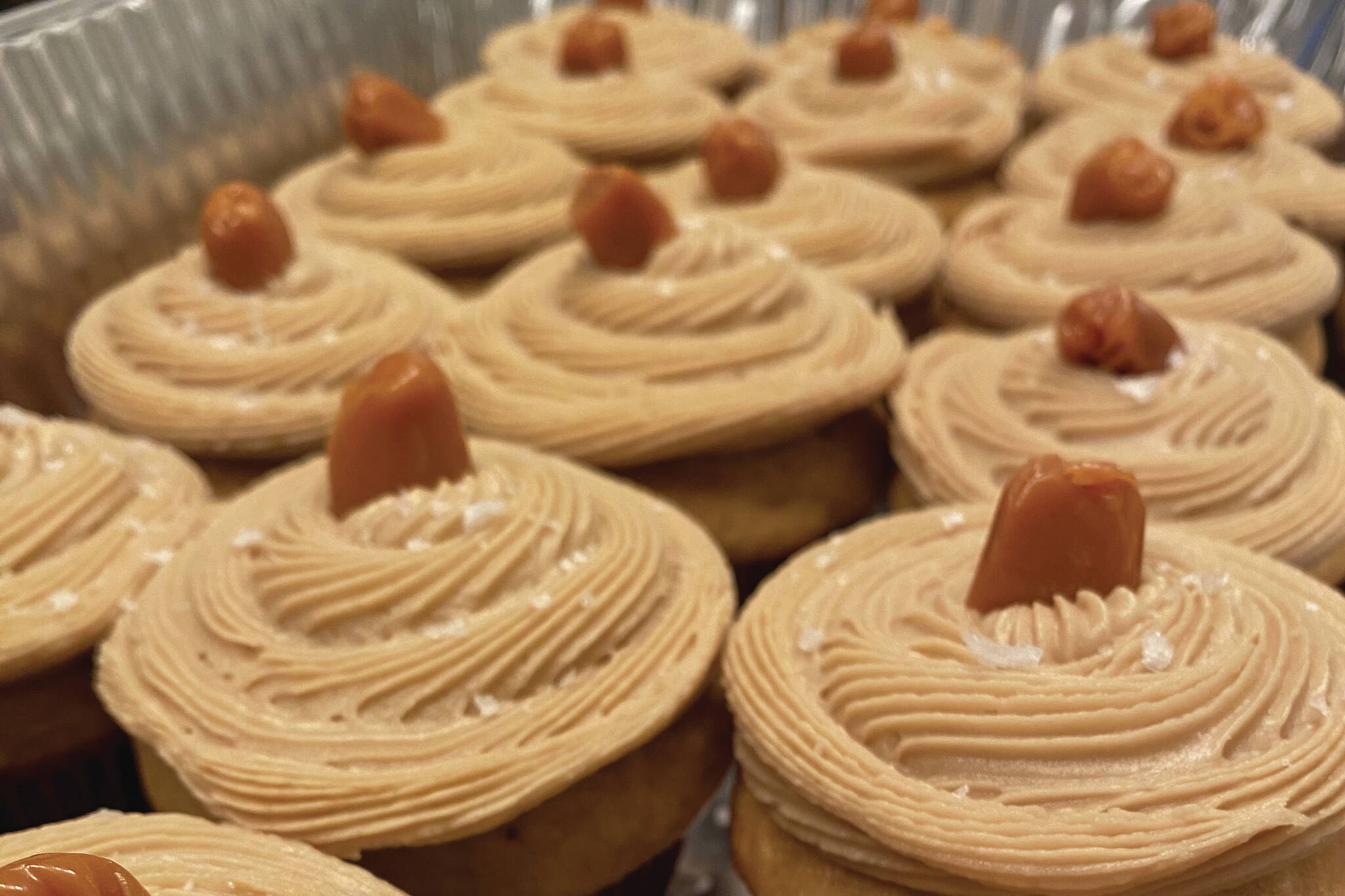 These salted caramel cupcakes topped with caramel candy balance sweetness with Maldon salt. (Photo by Tressa Dale/Peninsula Clarion)
