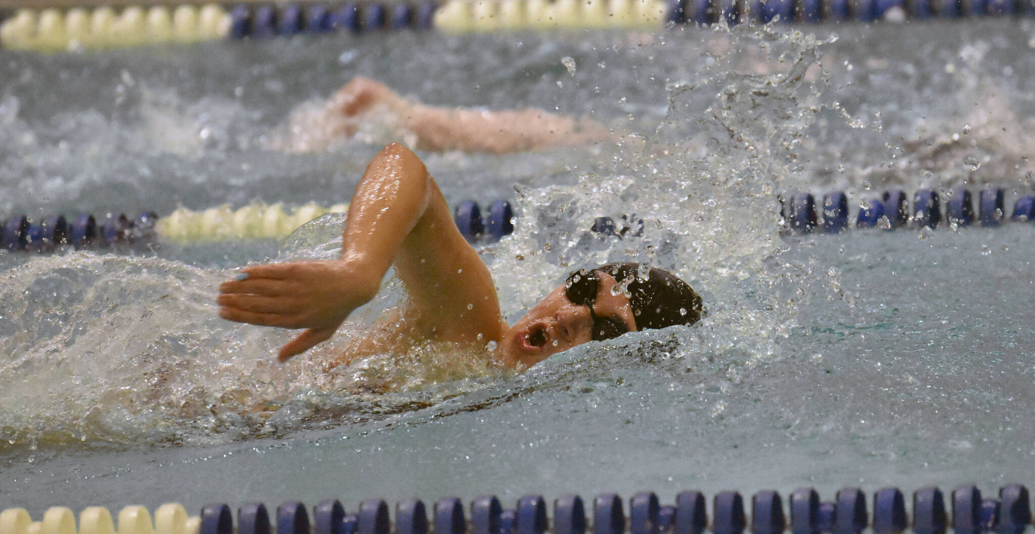 Kenai Central’s Abigail Price finishes second in the 500-yard freestyle Saturday, Oct. 28, 2023, at the Northern Lights Conference swim meet at Soldotna High School in Soldotna, Alaska. (Photo by Jeff Helminiak/Peninsula Clarion)